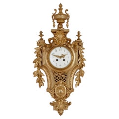 Antique French Louis XVI style gilt bronze cartel clock