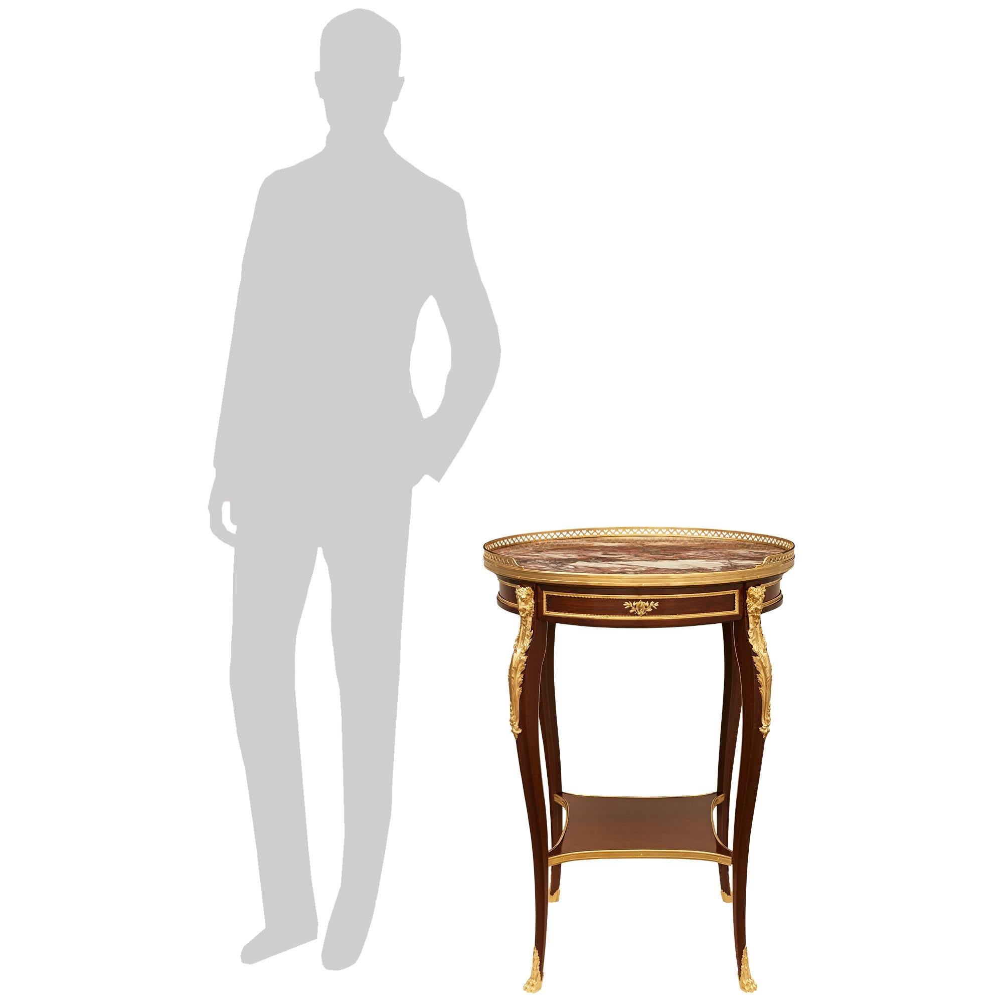 A most elegant and high quality French 19th century Louis XV st. Belle Epoque Period Mahogany, Ormolu and Breche Violette marble side table. This exceptional table is raised by four slender cabriole legs ending with pawed Ormolu sabots and top