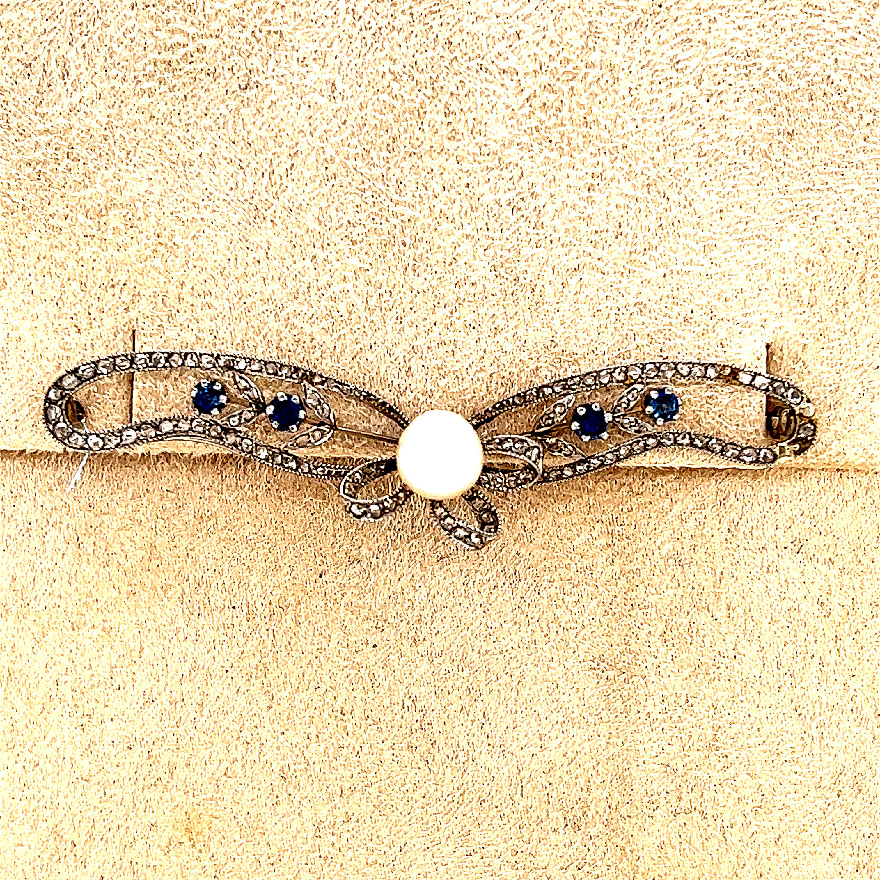 Belle Epoque Platinum Ribbon Brooch with Pearl Diamonds & Sapphires In Good Condition For Sale In MIAMI, FL