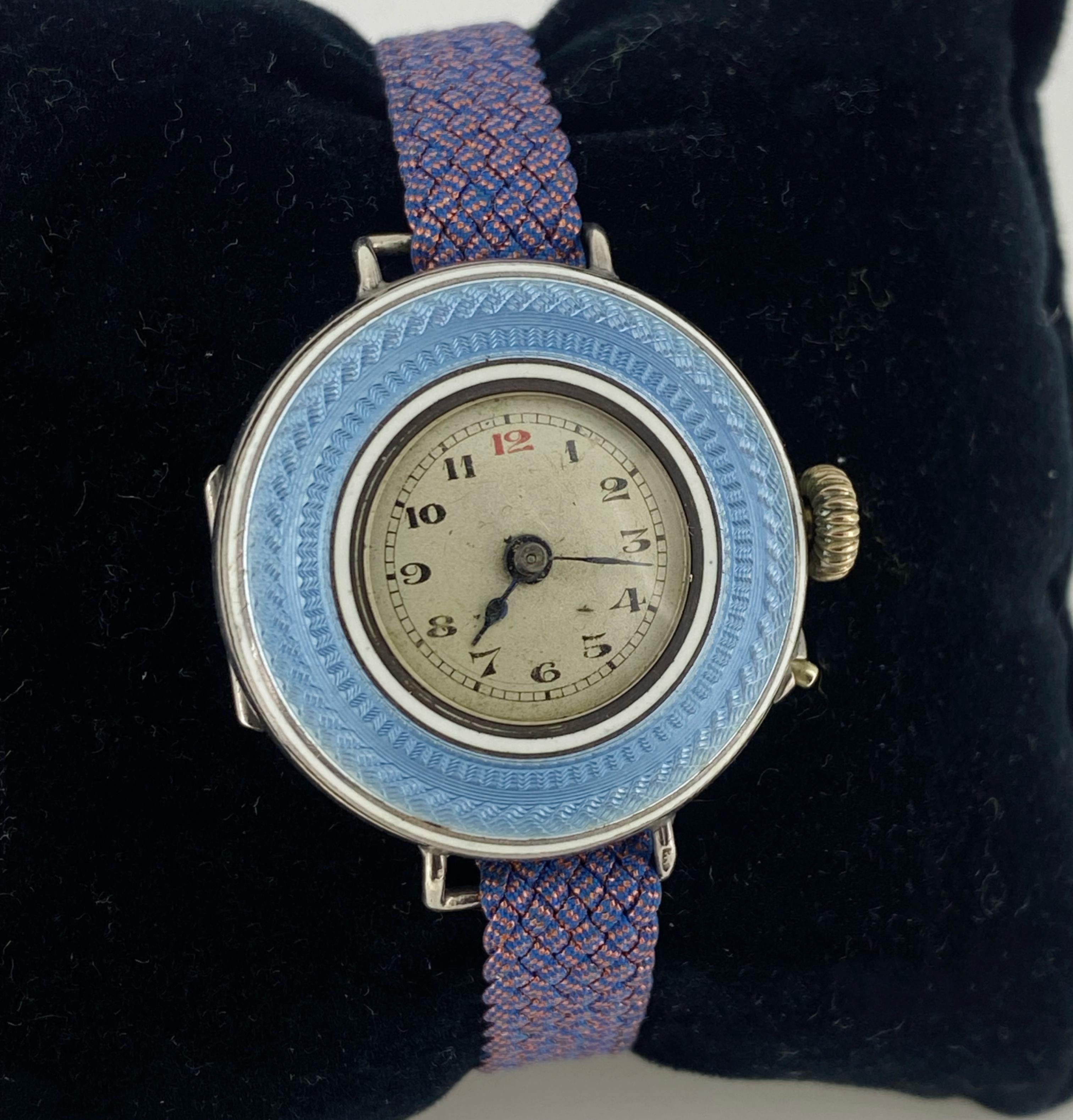 This Fine & Rare Belle Epoque circa 1910’s 
Ladies’ Wristwatch features: 

Hinged Case crafted in Solid Silver  
of unusually large (for that period) size 
measuring 28mm (not including winder);

Caseback is hallmarked, stamped 0.935 & 
numbered