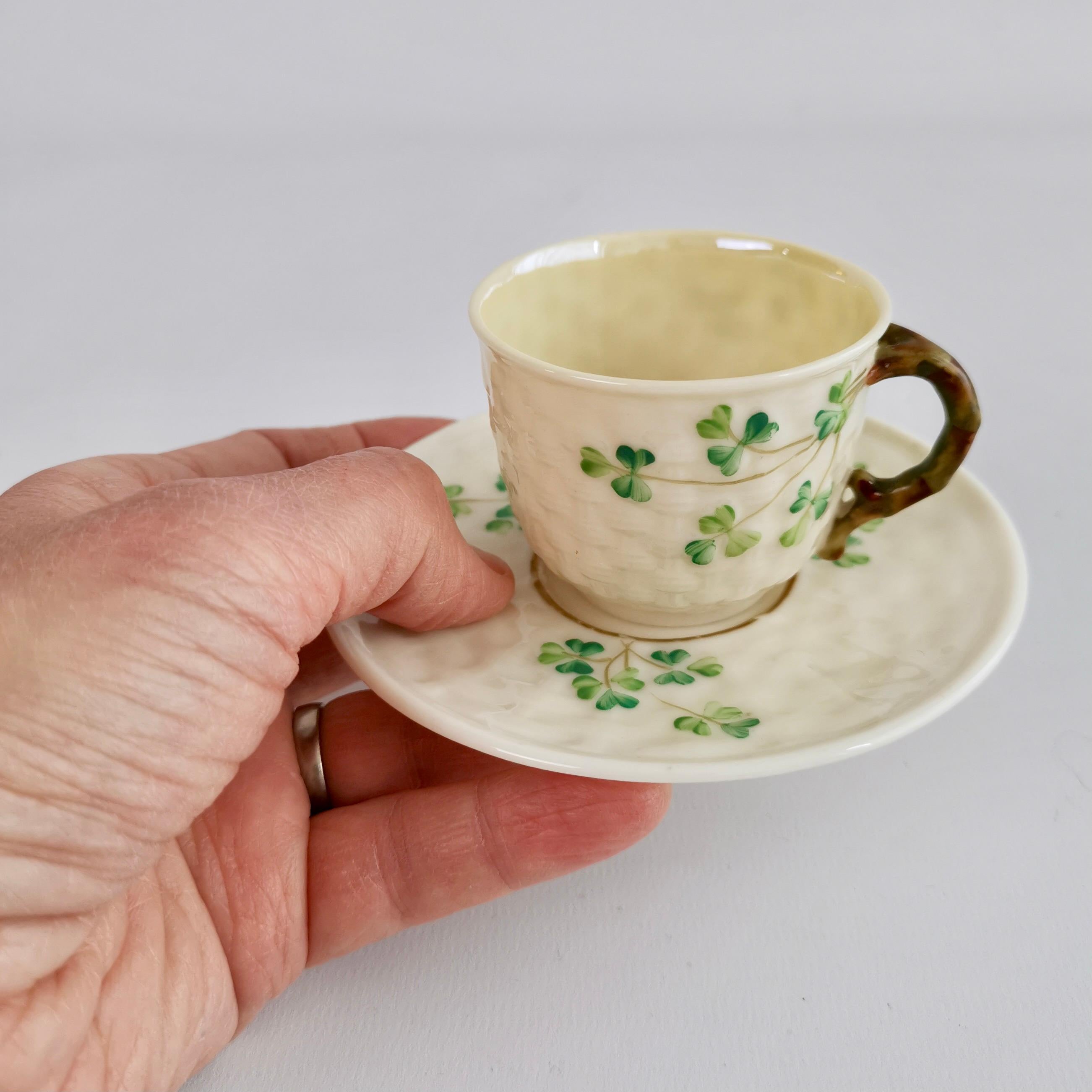 This is a very charming Belleek demitasse cup and saucer in the Shamrock design with the 3rd Black Mark, which was used between 1926 and 1946. 

These demitasse cups are rare so this is a great opportunity - and this would make a wonderful little