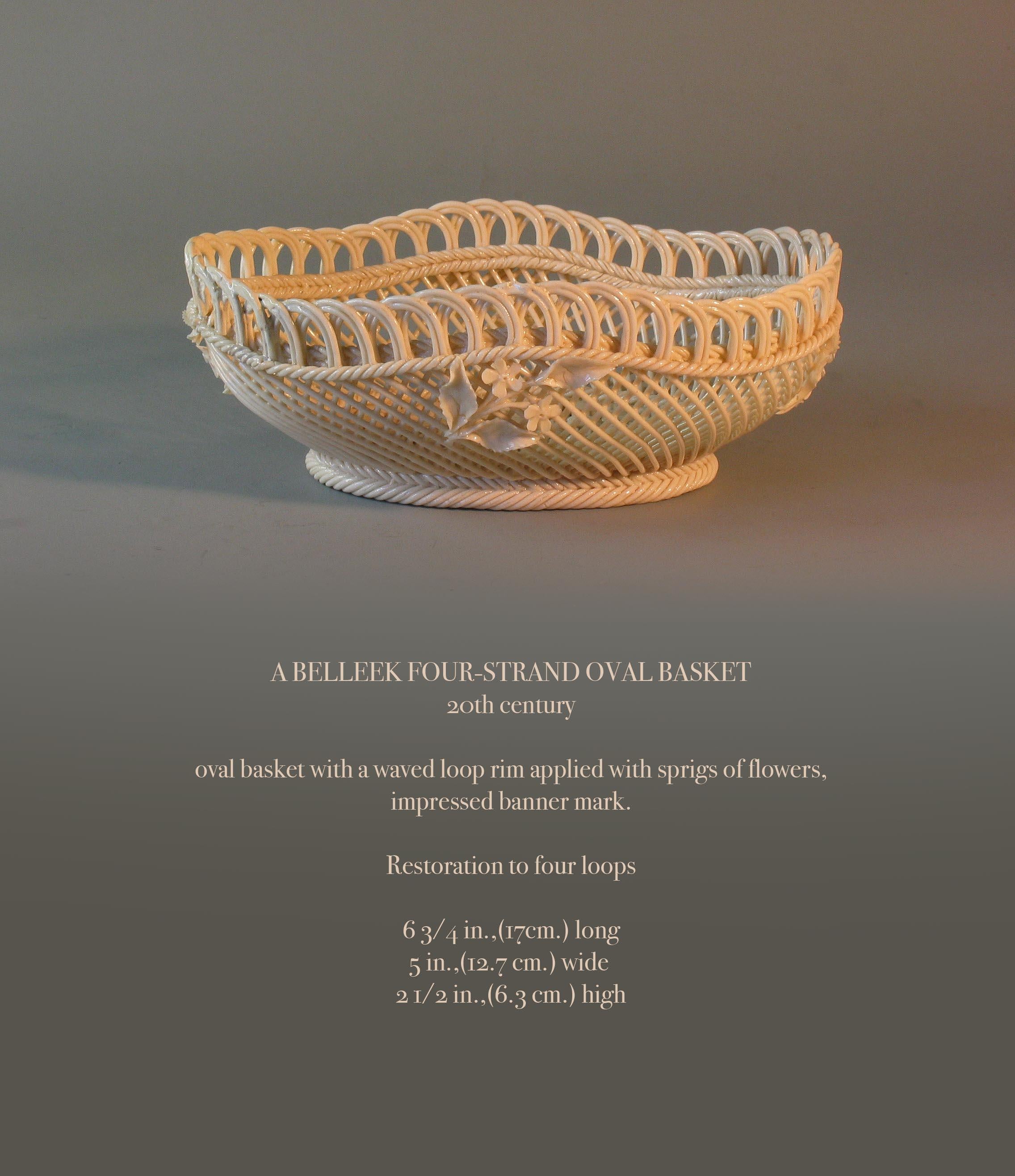 A Belleek four-strand oval basket
20th century

Oval basket with a waved loop rim applied with sprigs of flowers,
impressed banner mark.

Note:
Restoration to four loops, as in photo's.

Measures: 6 3/4