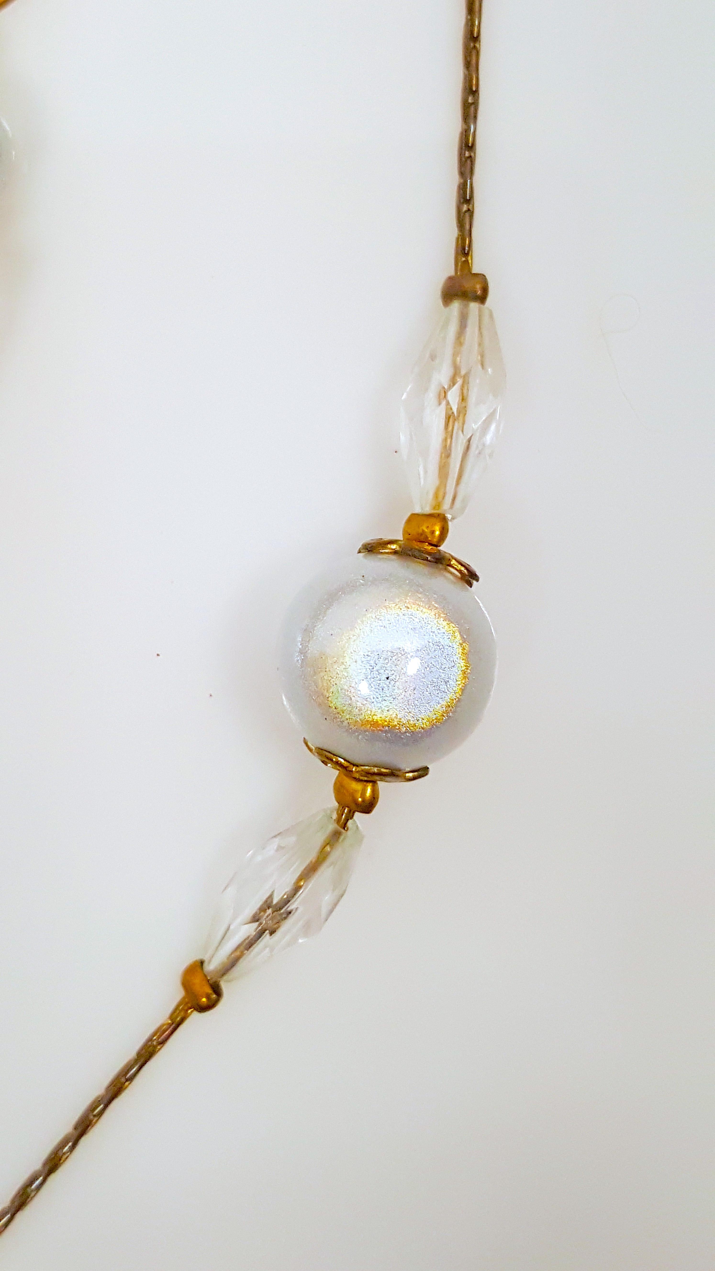 This antique French Belle-Epoque-period set incudes eight rare ball-cut moonstones beaded on a delicate gilt choker necklace and wire-hook dangle earrings for pierced ears. The necklace features two 12mm gilt-filigree-capped moonstones with atypical