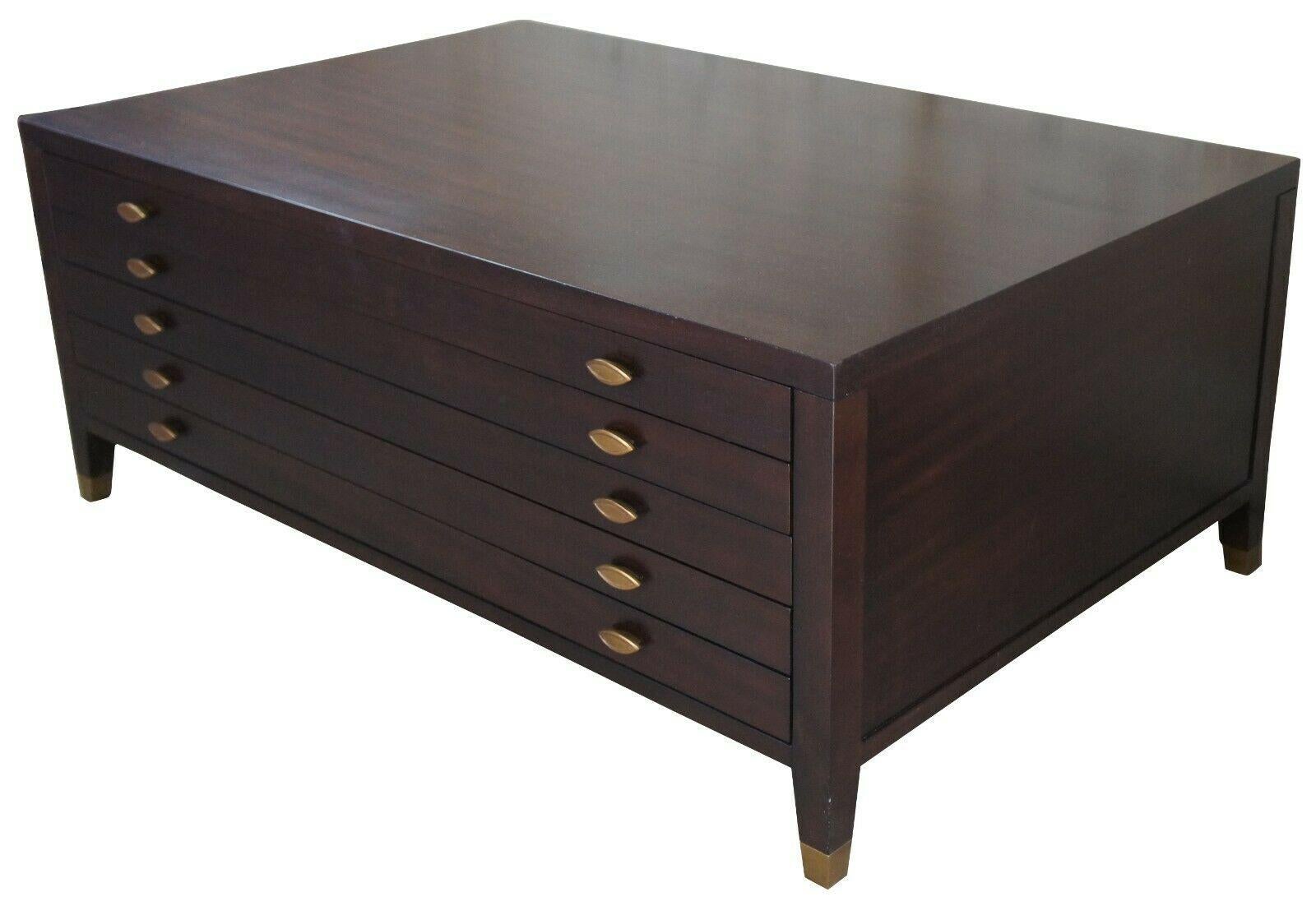 Bellemeade Signature Blake map coffee table mahogany Apothecary storage cabinet

Bellemeade Signaure Blake map coffee table. Made from mahogany with five drawers on each side. Each drawer is dovetailed and includes two brass pulls. Legs are