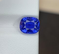 Bellerophon Certified Intense Blue Sapphire: Faceted Gemstone Cushion 5.049 CTs