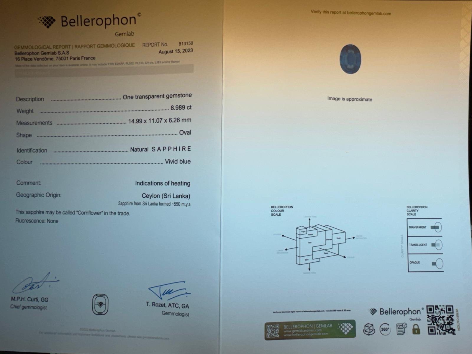 Anello da cocktail ispirato a Lady Diana con uno zaffiro taglio ovale di 8,98 carati affiancato da 14 brillanti rotondi di 1,96 carati, realizzato in oro bianco 18 carati. 
Bellerophon Certificato
Origine: Ceylon, Sri Lanka
Riscaldato
Colore: blu