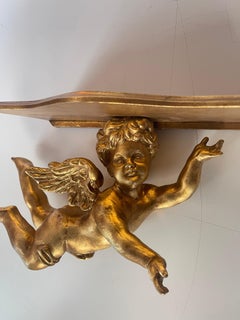 Beautiful small shelf angels in gold leaf