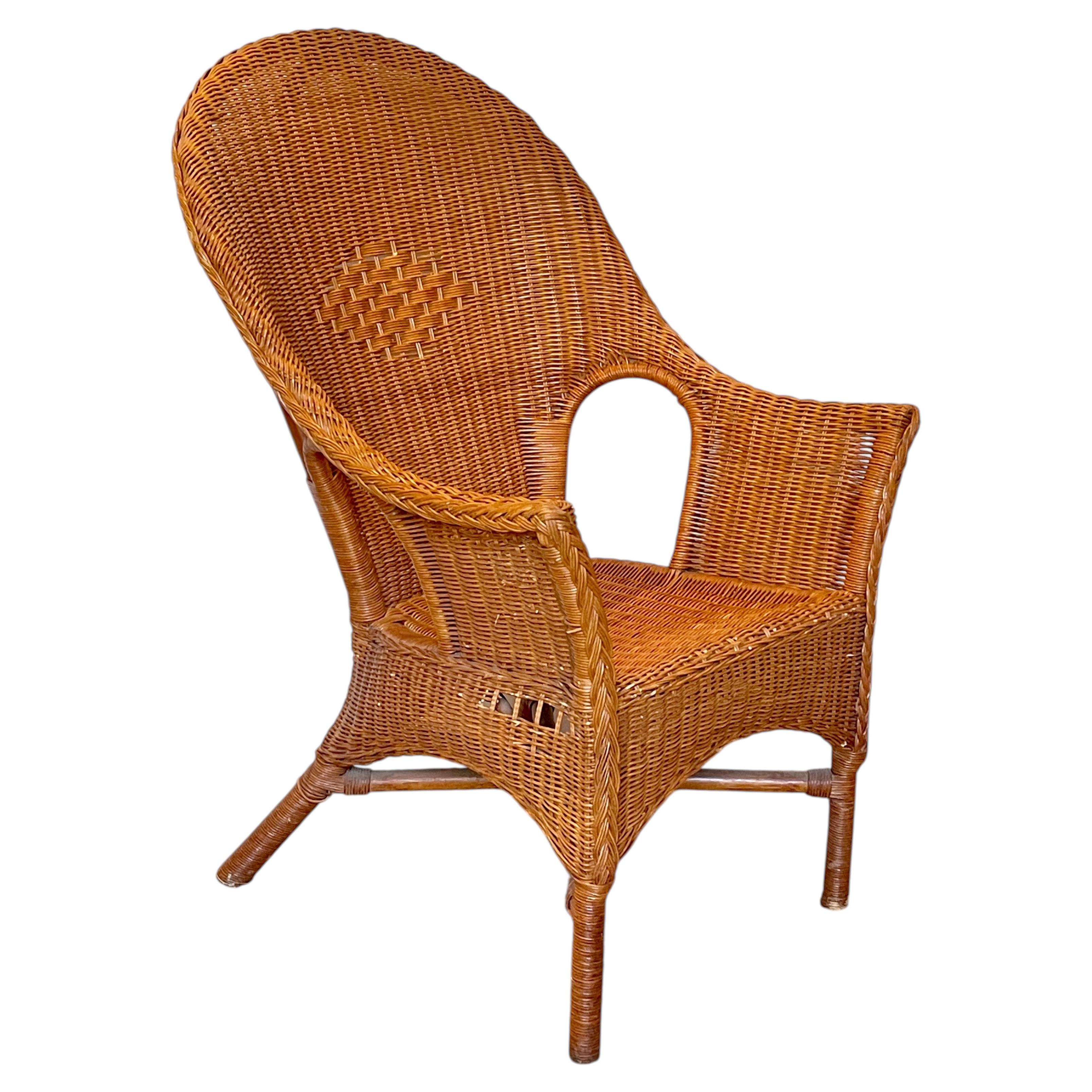 A beautiful woven wicker armchair, "Royal Wicker," from the 1970s For Sale
