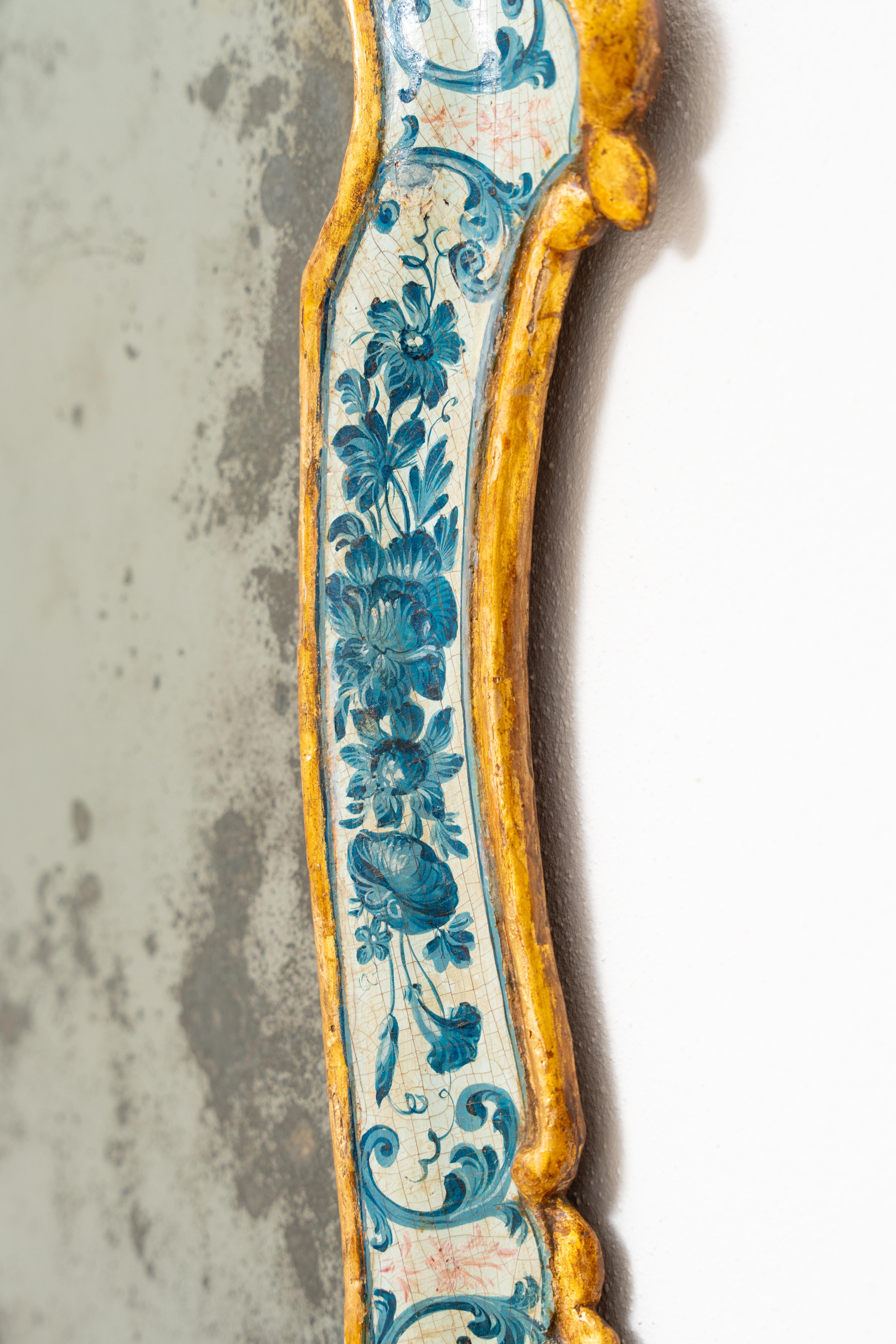 Louis XV Beautiful Venetian mirror made of lacquered and gilded wood.