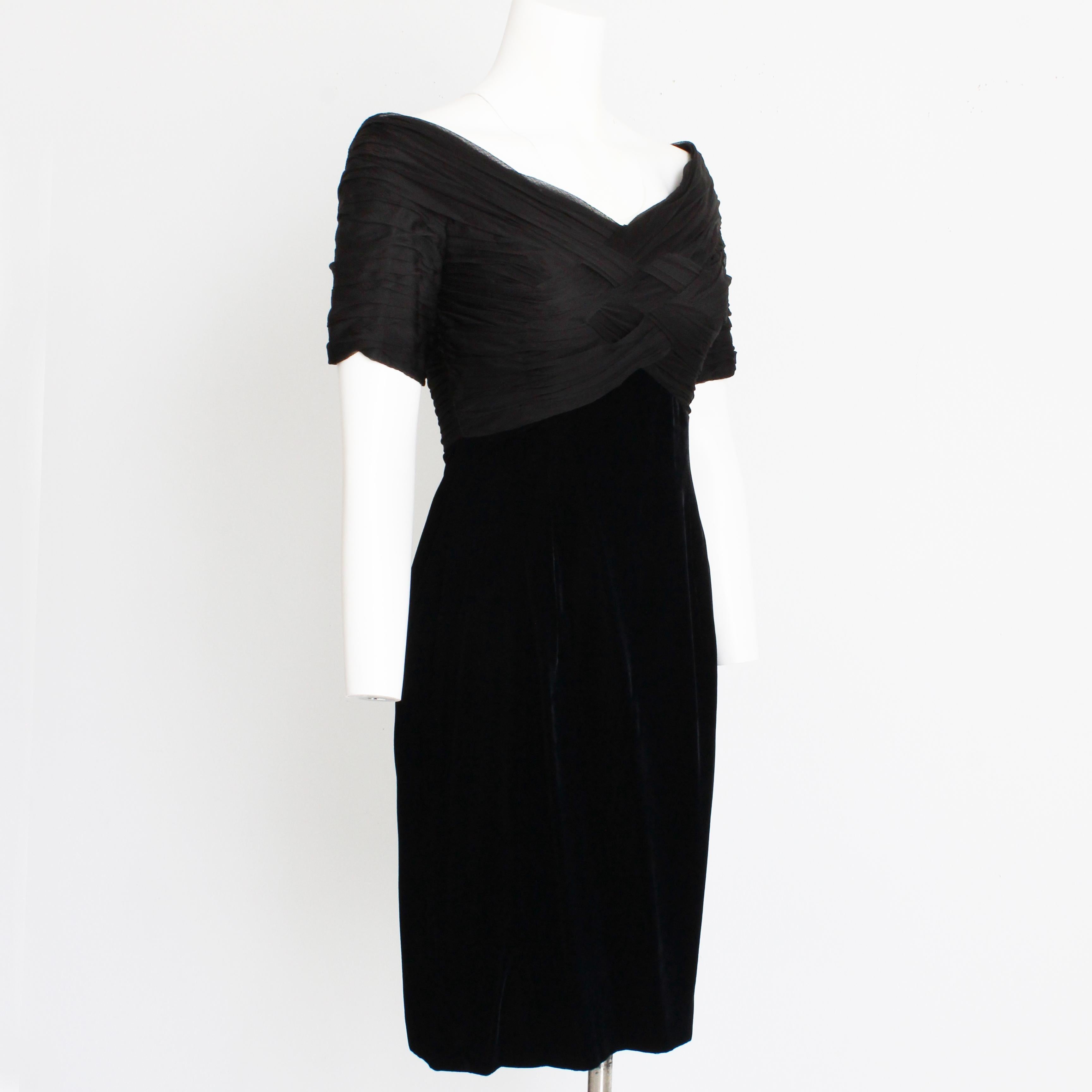 Authentic, preowned, vintage Bellville Sassoon Lorcan Mullany black woven silk bodice cocktail dress, likely made in the 90s.  Made from silk and rayon, it features a gorgeous woven bodice, an empire waist and black velvet skirt.  

An incredibly