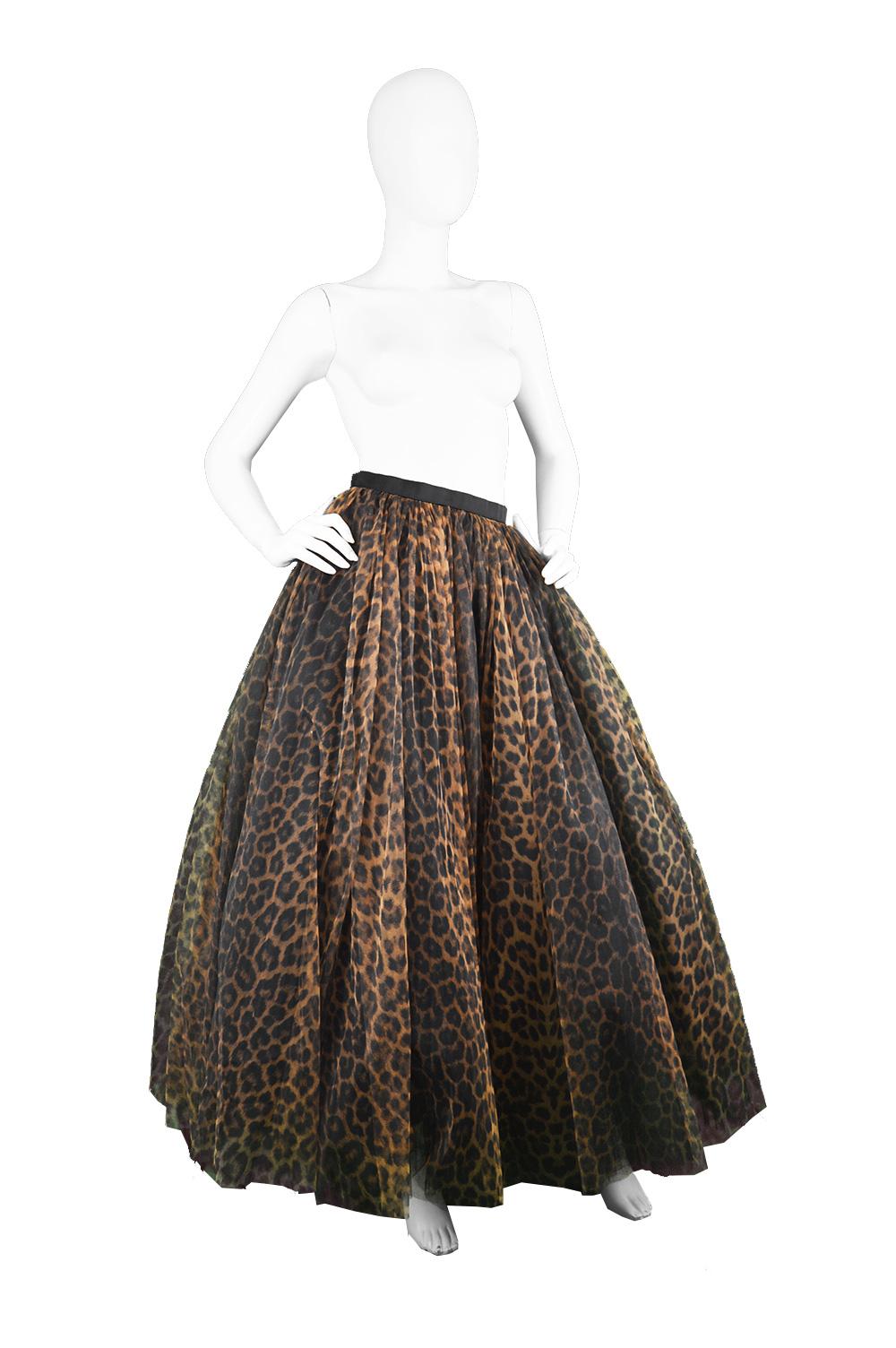 Bellville Sassoon Vintage Leopard Print Huge Full Tulle Evening Skirt, 1980s

Estimated Size: UK 6/ US 2/ EU 34. Please check measurements. 
Waist - 24” / 61cm
Hips - Free
Length (Waist to Hem) - 40” / 101cm

Condition: Very Good Vintage Condition -