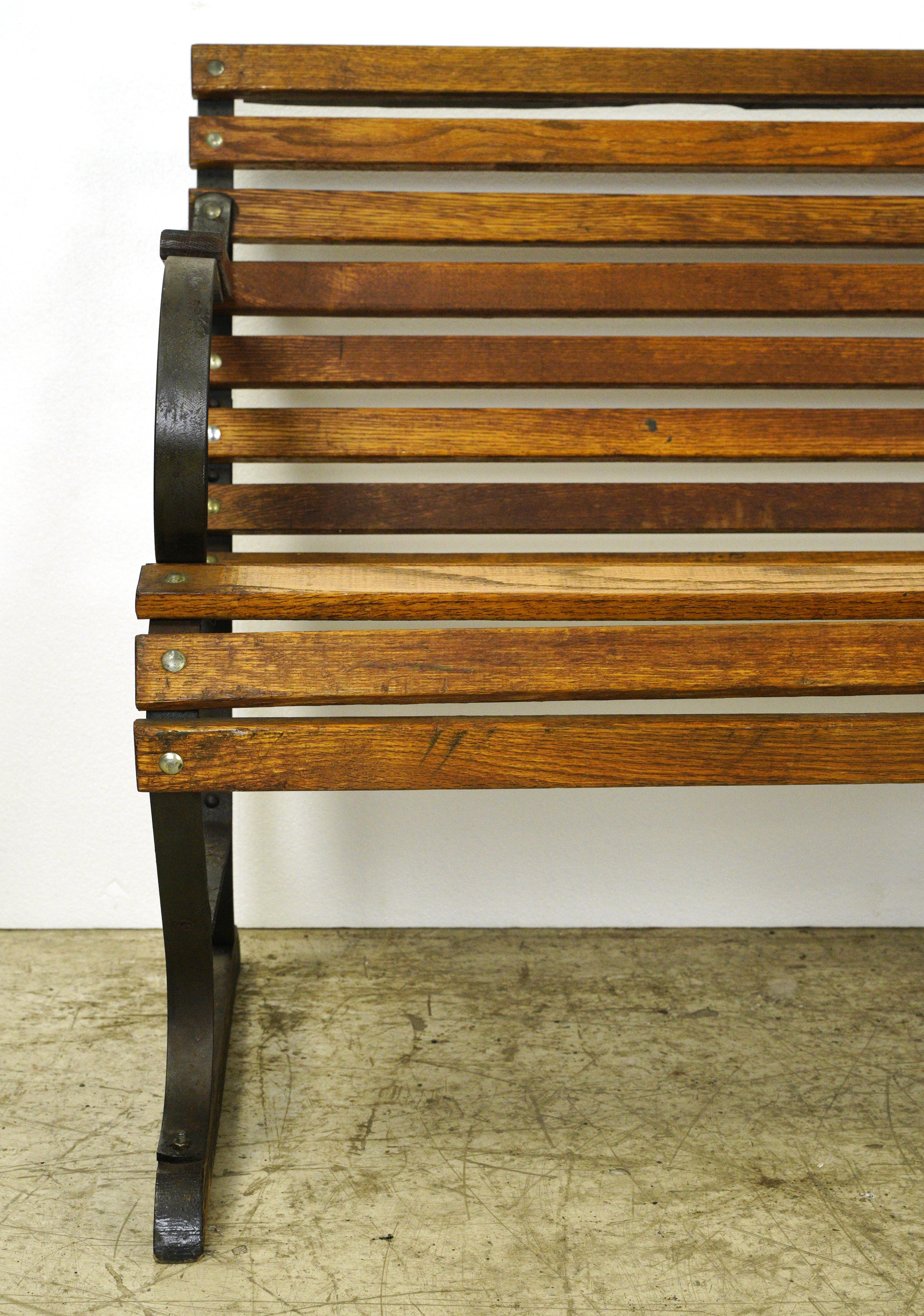 Belmont Park Racetrack in Elmont, New York oak park bench. The natural finish oak benches were under the roof and were not exposed to the elements. The green painted ones (separate listing) were outside the main stadium and are nicely weathered.