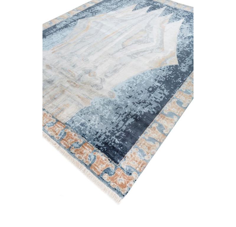 Are you looking to add a touch of timeless elegance to your living space? Allow us to introduce you to Belomancy, a masterpiece from the Woven Gems collection by Late Jocelyn Burton. This beautiful rug is available in a range of standard sizes