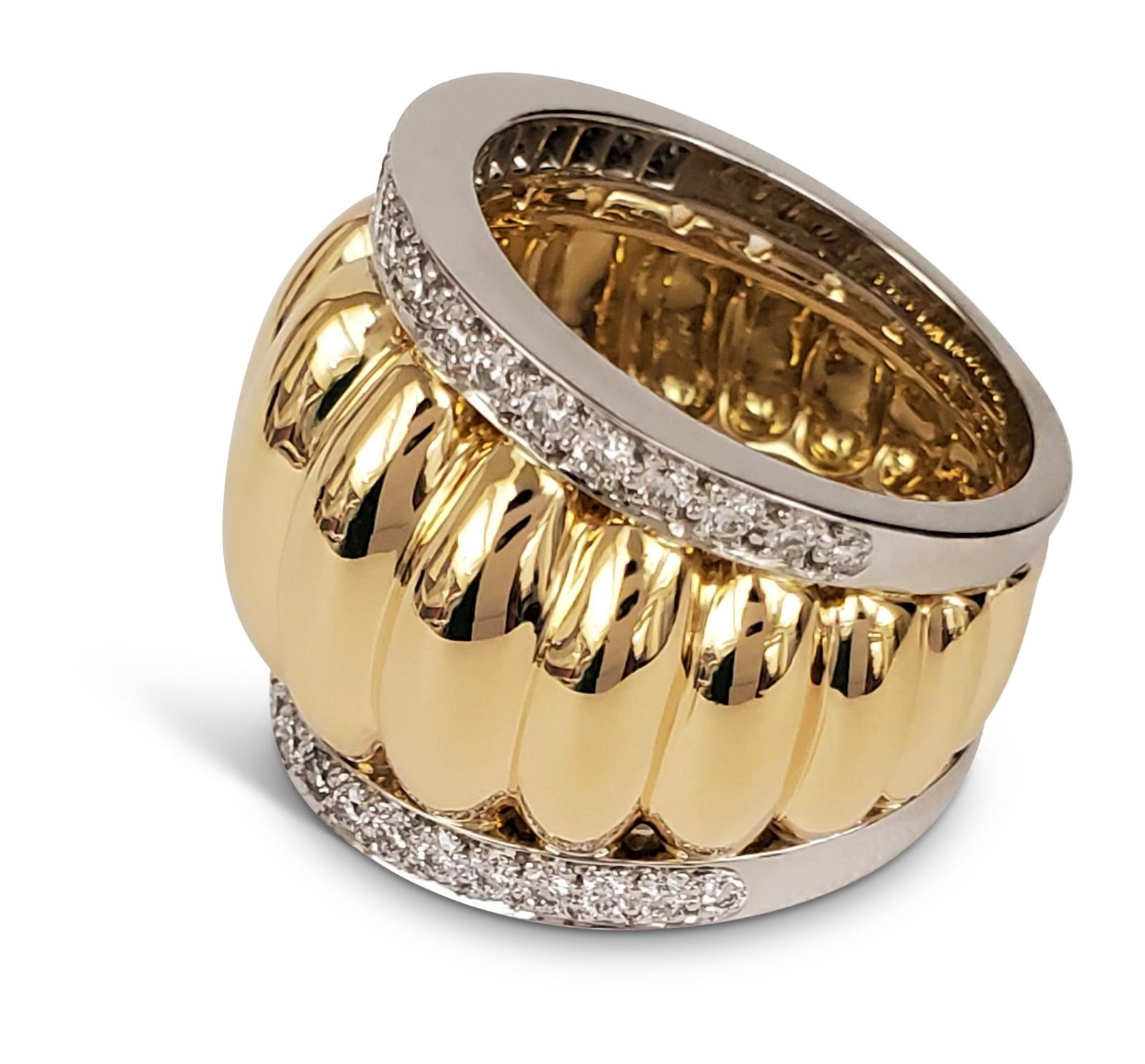 The Belperron collection was created from original archives of paintings and designs, all of which embody the spirit of Belperron’s aesthetic. The ring is crafted in 18 karat fluted yellow gold along with platinum set with an estimated 1.20 carats