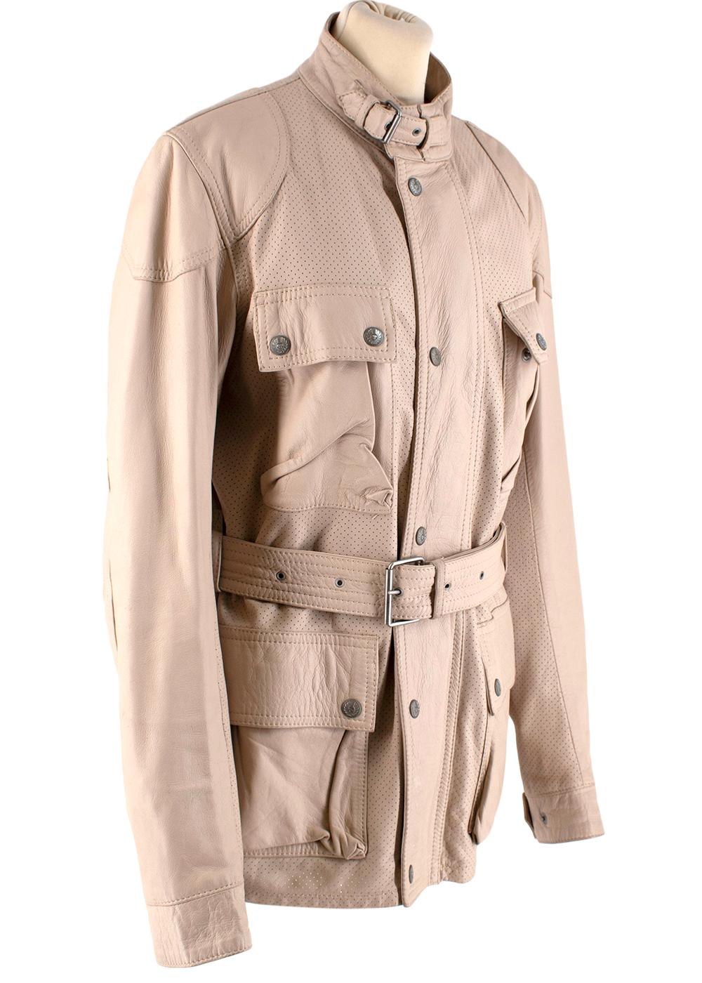 Belstaff Beige Leather Trialmaster Belted Jacket
-Soft, luxurious leather material
-Gorgeous beige hue
-Silver hardware
-Hidden zipper enclosure down front with buttons
-Four bellows pockets with dual press stud closure
-Signature logo plague on