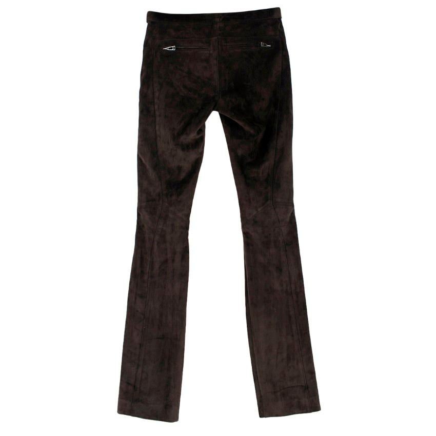 Belstaff Brown Suede Trousers
 
 - Brown suede trousers
 - Lightweight
 - Mid-rise waist
 - Front push through and zip fastening
 - Slim fit
 - Front side pockets
 - Back zipped pockets
 
 Please note, these items are pre-owned and may show some