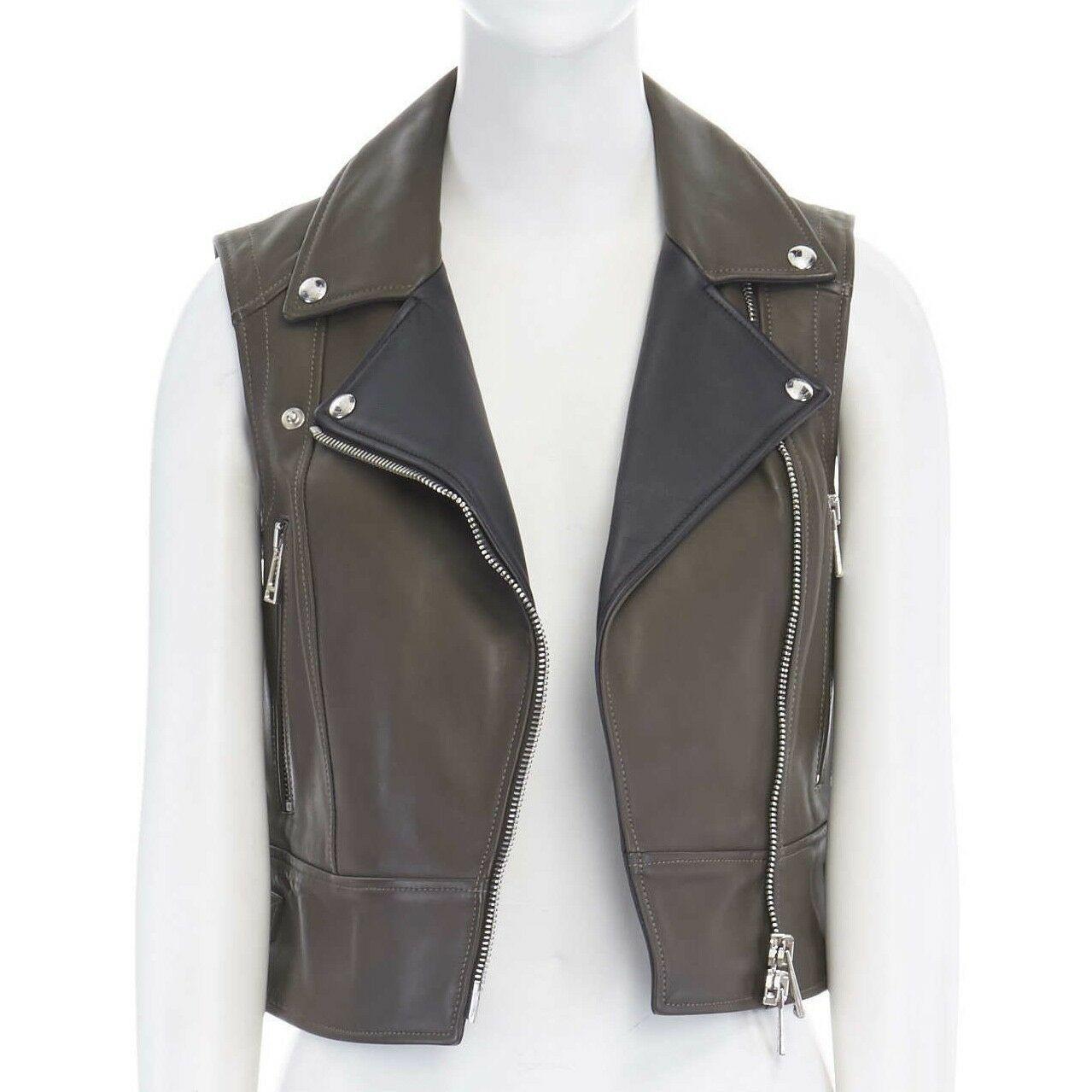 BELSTAFF khaki green black leather silver hardware biker vest FR36 US2 XS
BELSTAFF
Khaki green leather . 
Contrast black leather lining visible at foldover collar . 
Silver hardware . 
Dual zip front pocket with enlarged zipper pull signed Belstaff