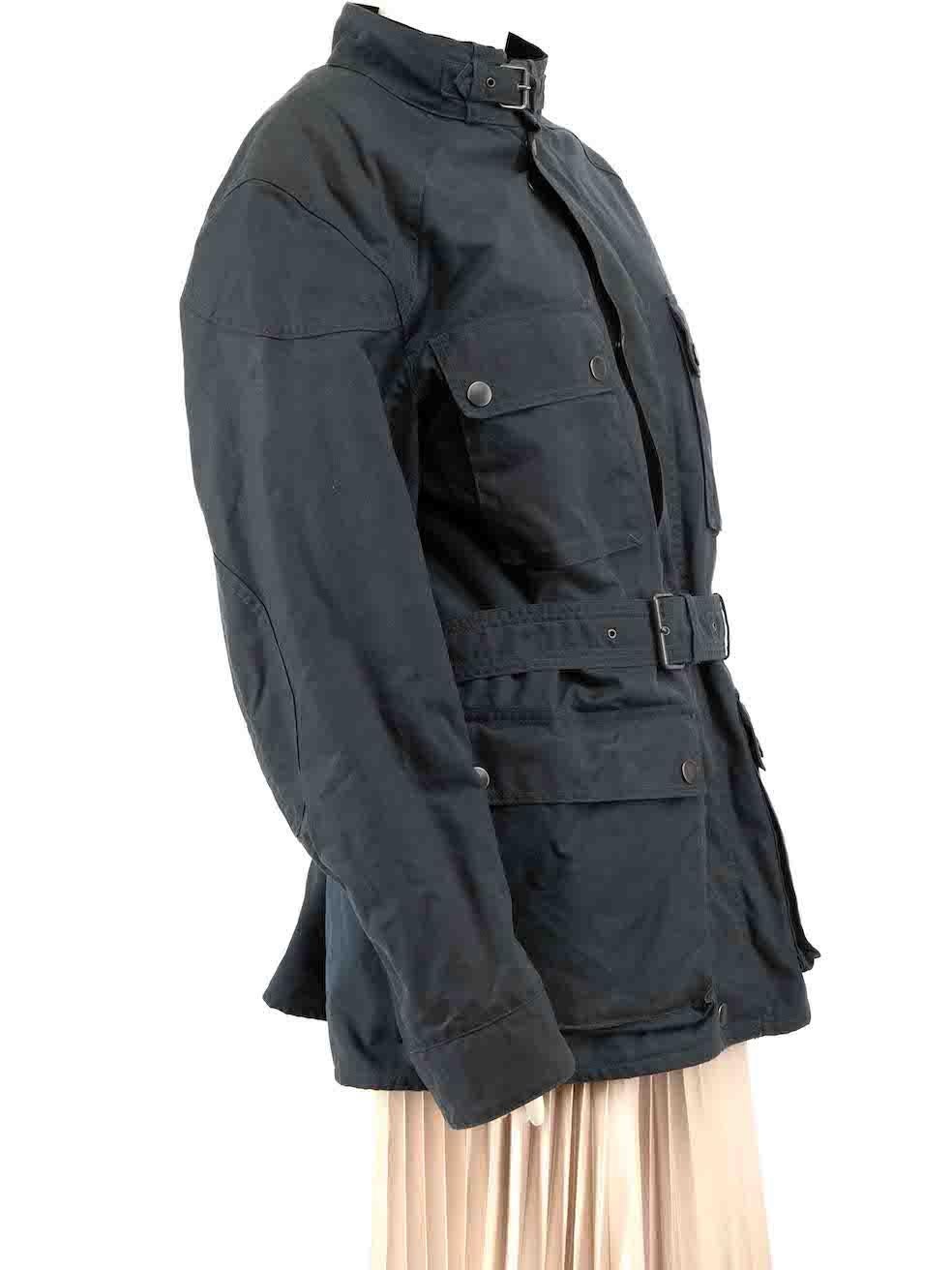 CONDITION is Good. General wear to coat is evident. Moderate signs of wear to the front, sleeves and belt with light marks across the fabric, and the lining has started pilling. The coat also has a musty odour on this used Belstaff designer resale