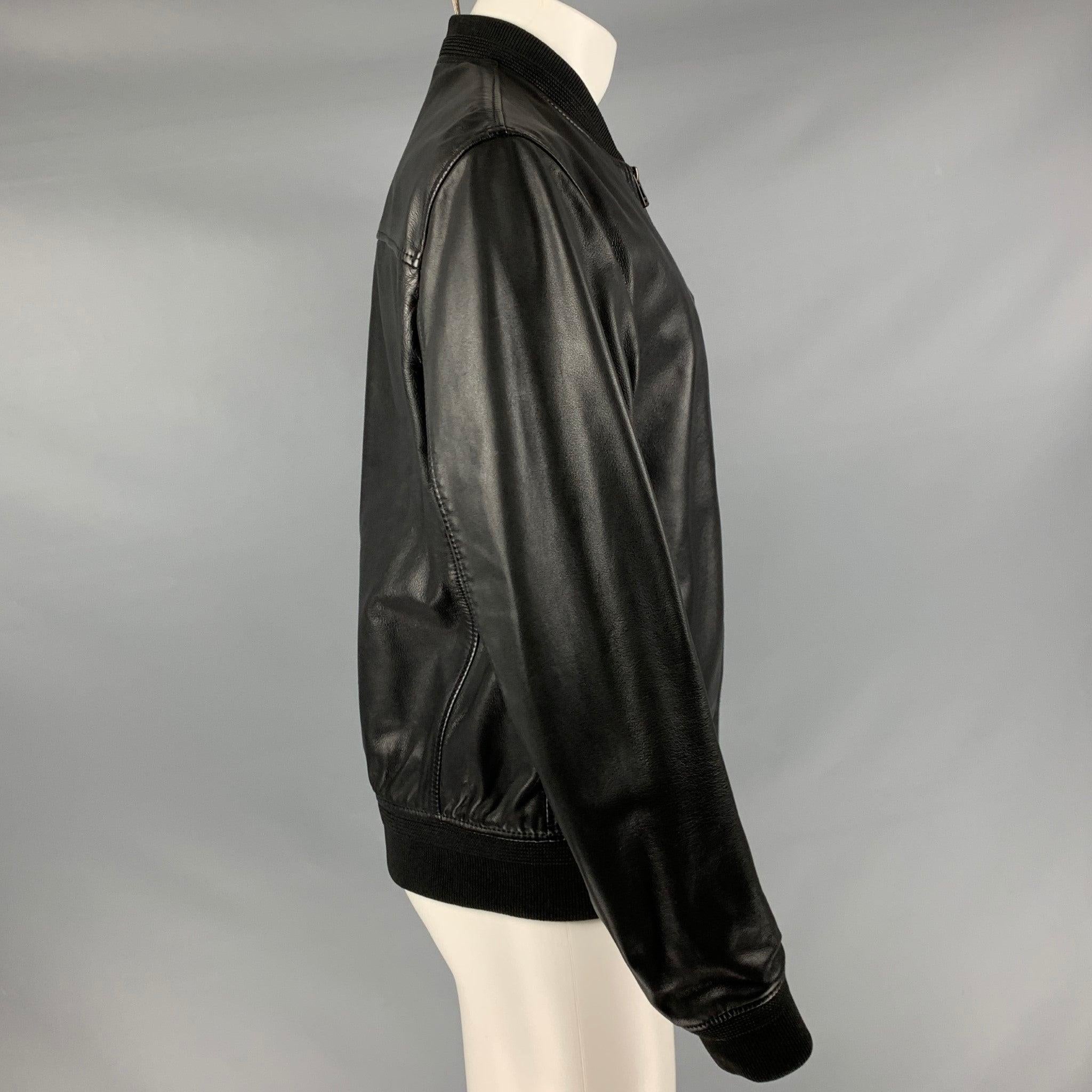 BELSTAFF
jacket in black sheep leather fabric featuring viscose lining, bomber style, ribbed collar, and zip up closure.New with Tags. 

Marked:   38 

Measurements: 
 
Shoulder: 17.5 inches Chest: 38 inches Sleeve: 25.5 inches Length: 26 inches 
 