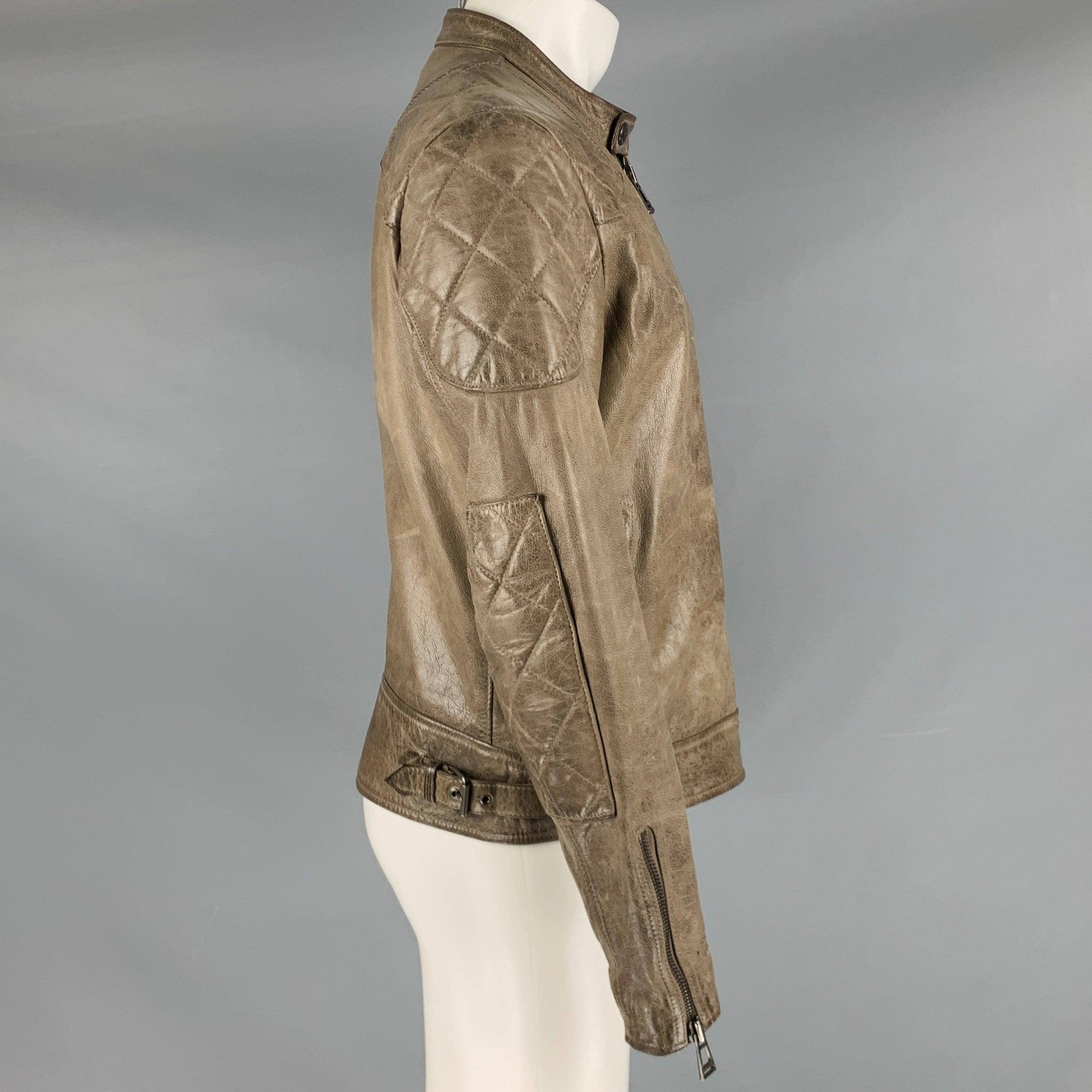 BELSTAFF jacket
in a grey taupe leather fabric featuring a motorcycle style, quilted shoulders, zip pockets, and zip up closure.
Made in Italy.Very Good Pre-Owned Condition. Moderate signs of wear. 

Marked:   IT 50 

Measurements: 
 
Shoulder: 17.5
