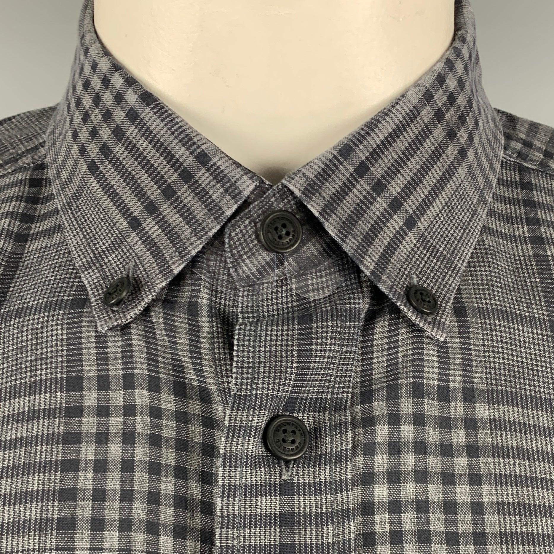 BELSTAFF long sleeve shirt
in a grey and black linen cotton blend woven fabric featuring a plaid pattern, one buttoned pocket, button down collar, and button closure.Very Good Pre-Owned Condition. Minor signs of wear. 

Marked:   L 

Measurements: 
