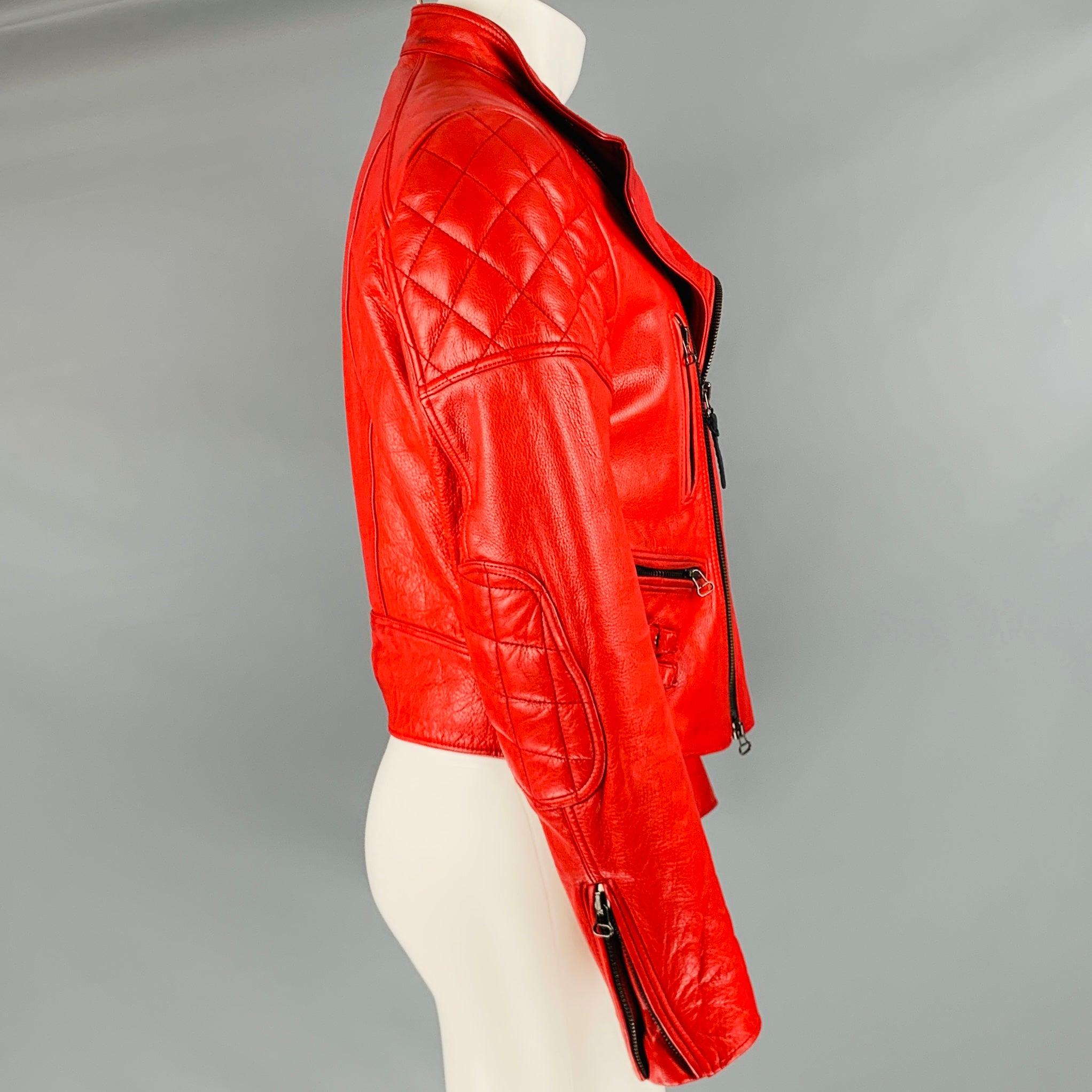 GOODWOOD SPORTS & RACING by BELSTAFF jacket
in a red leather fabric featuring a biker style, quilted shoulders, and zip up style. Good Pre-Owned Condition. As is, please check photos. 

Marked:   21020019 

Measurements: 
 
Shoulder: 18 inches