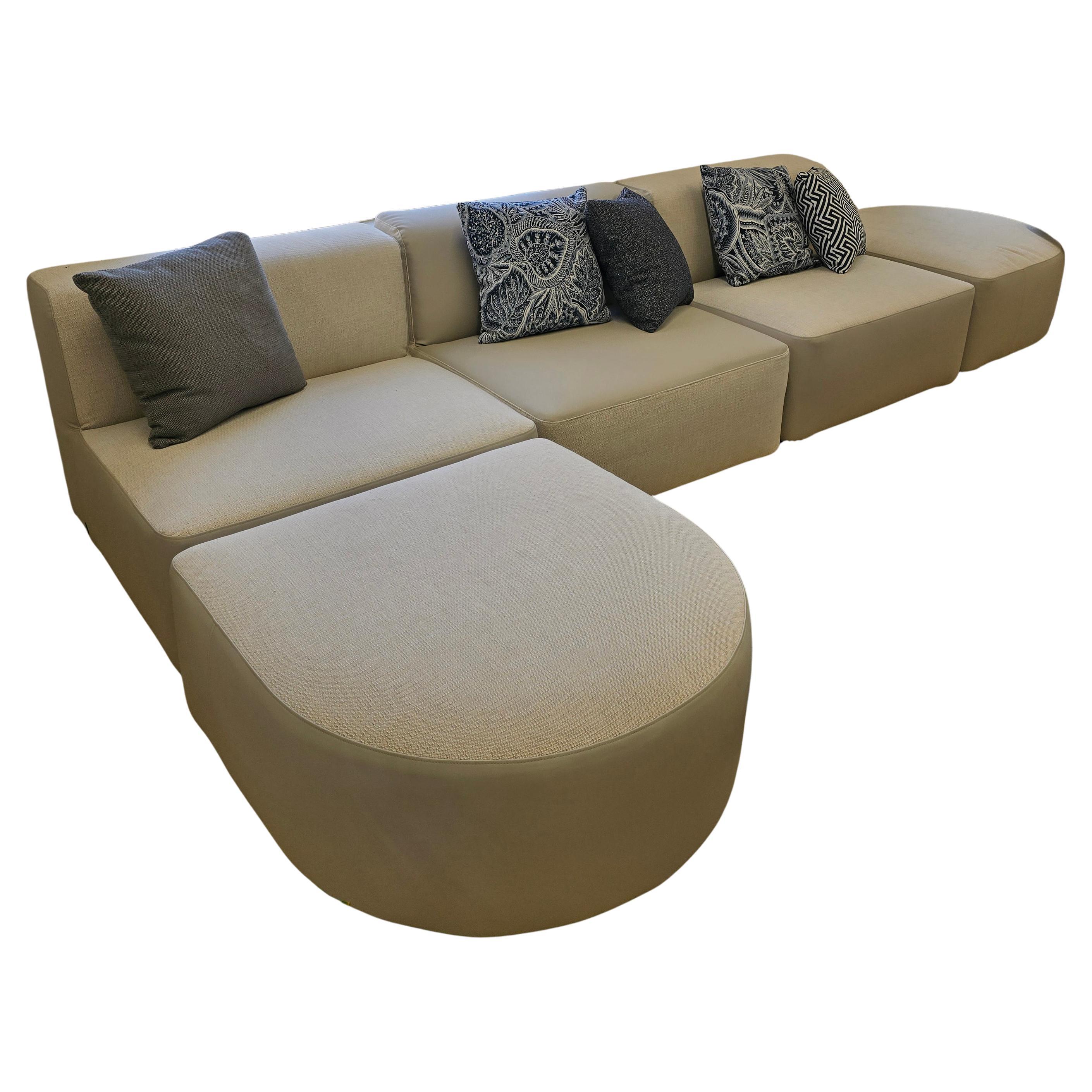 BELT Outdoor Modular Sofa
Manufacturer: Varaschin ( Made in Italy )
Design: Lo Scalzo Moscheri

Supporting structure in solid okume wood and padding with Dryfeel® open cell foam, suitable for outdoor use, with removable covers.
Weatherproof and UV