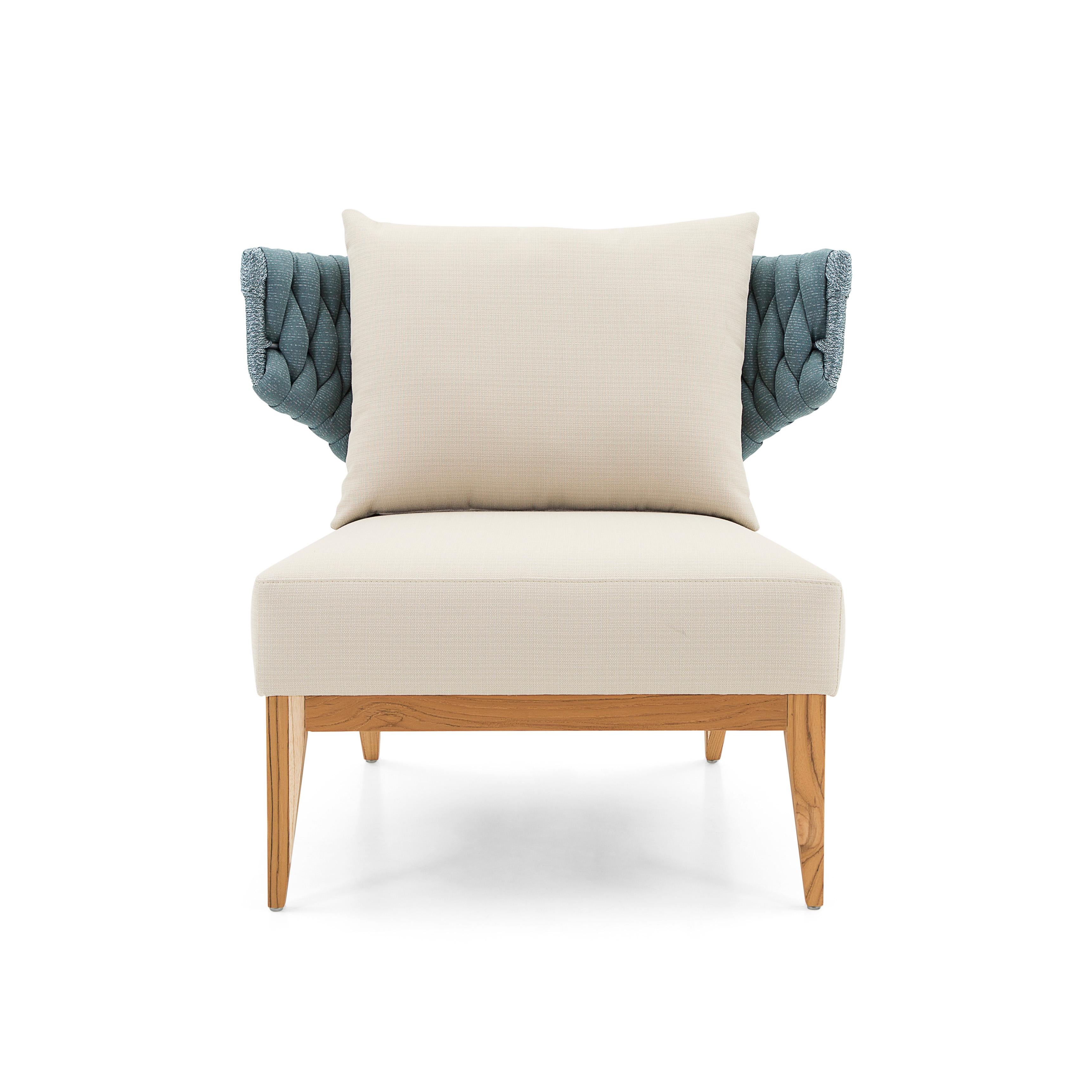 The Beluga chair is the perfect combination of a beige fabric covering the seat and pillow and a blue fabric for the back, with wood legs in a teak finish to match with this contemporary design. Uultis have designed this incredible armchair to give