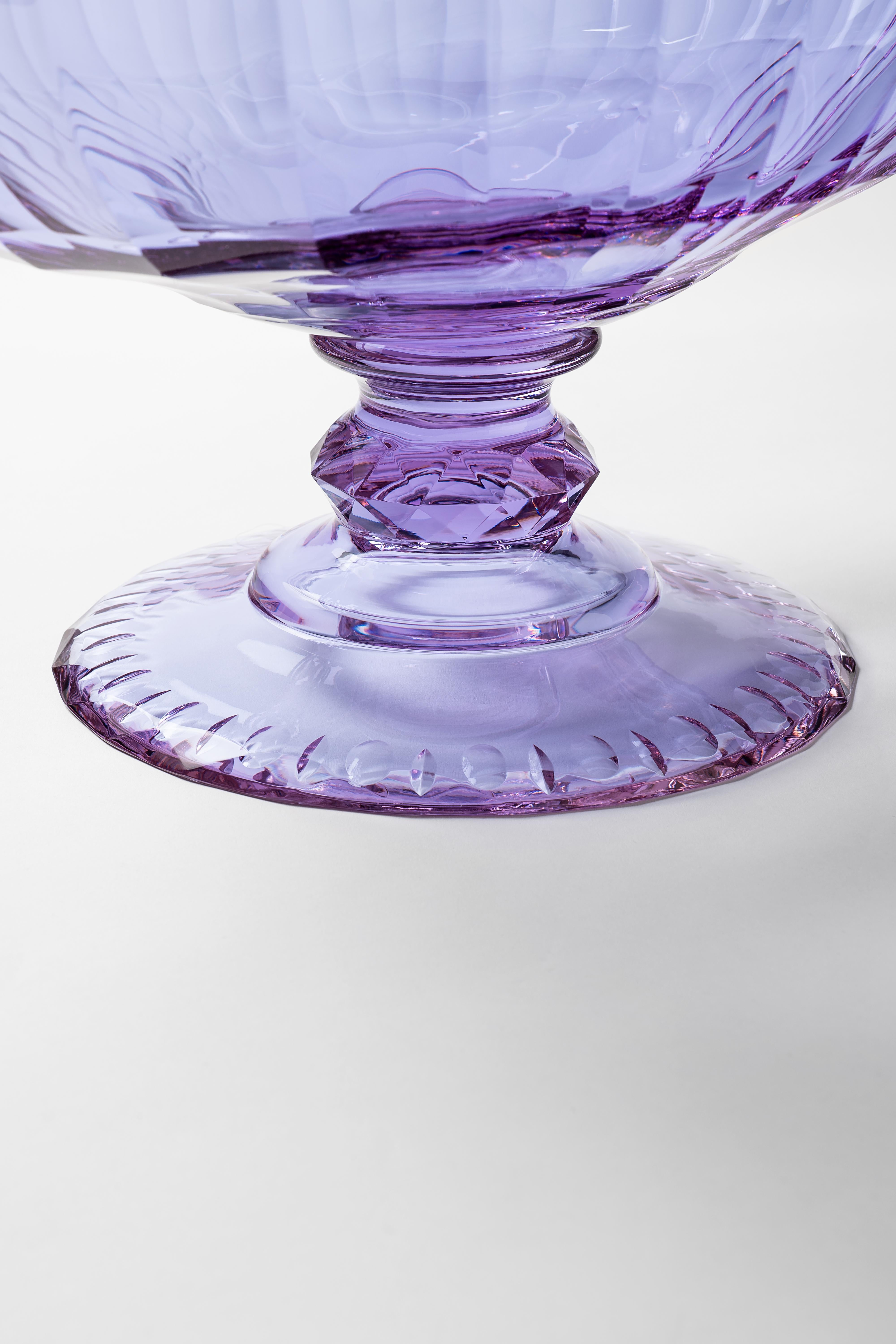 This unique cut-glass bowl is a true jewel created by the Moser glassmakers, cutters, engravers and other master craftsmen. It is modelled on a Baroque table collection used at the Viennese imperial court during the reign of Maria Theresa. In