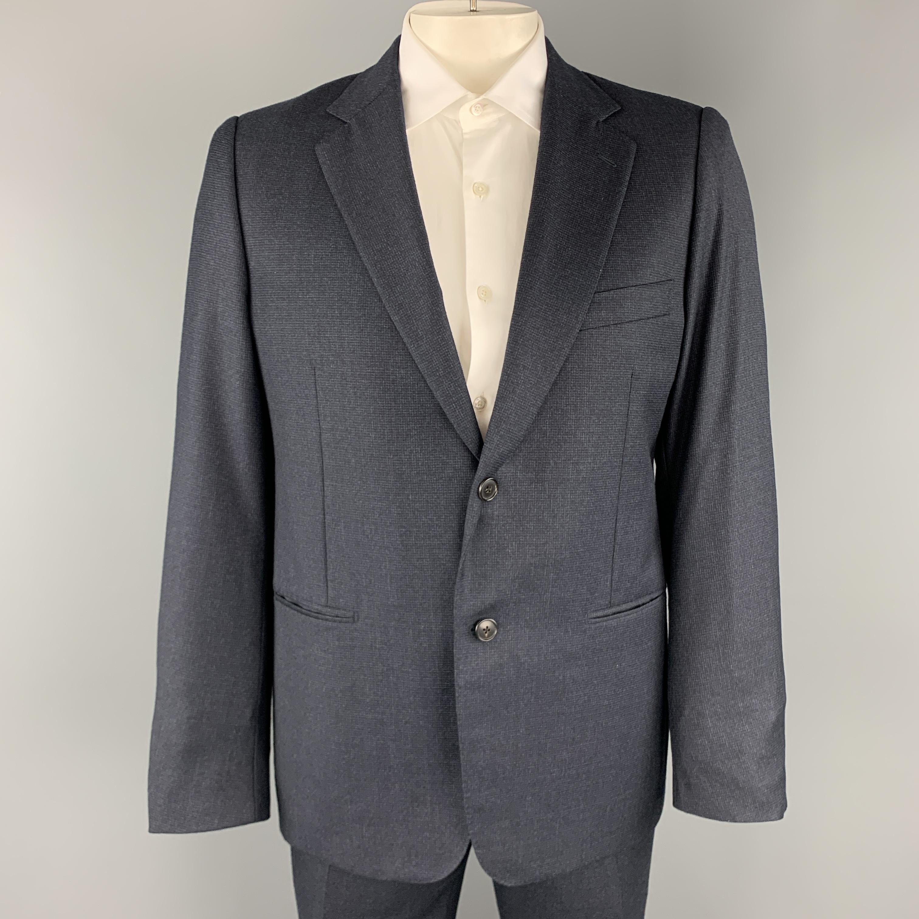 BELVEST suit comes in and includes a single breasted, two button sport coat with notch lapel and matching flat front trousers. Made in Italy.

Excellent Pre-Owned Condition.
Marked: IT 54

Measurements:

-Jacket
Shoulder: 17.5 in.
Chest: 45