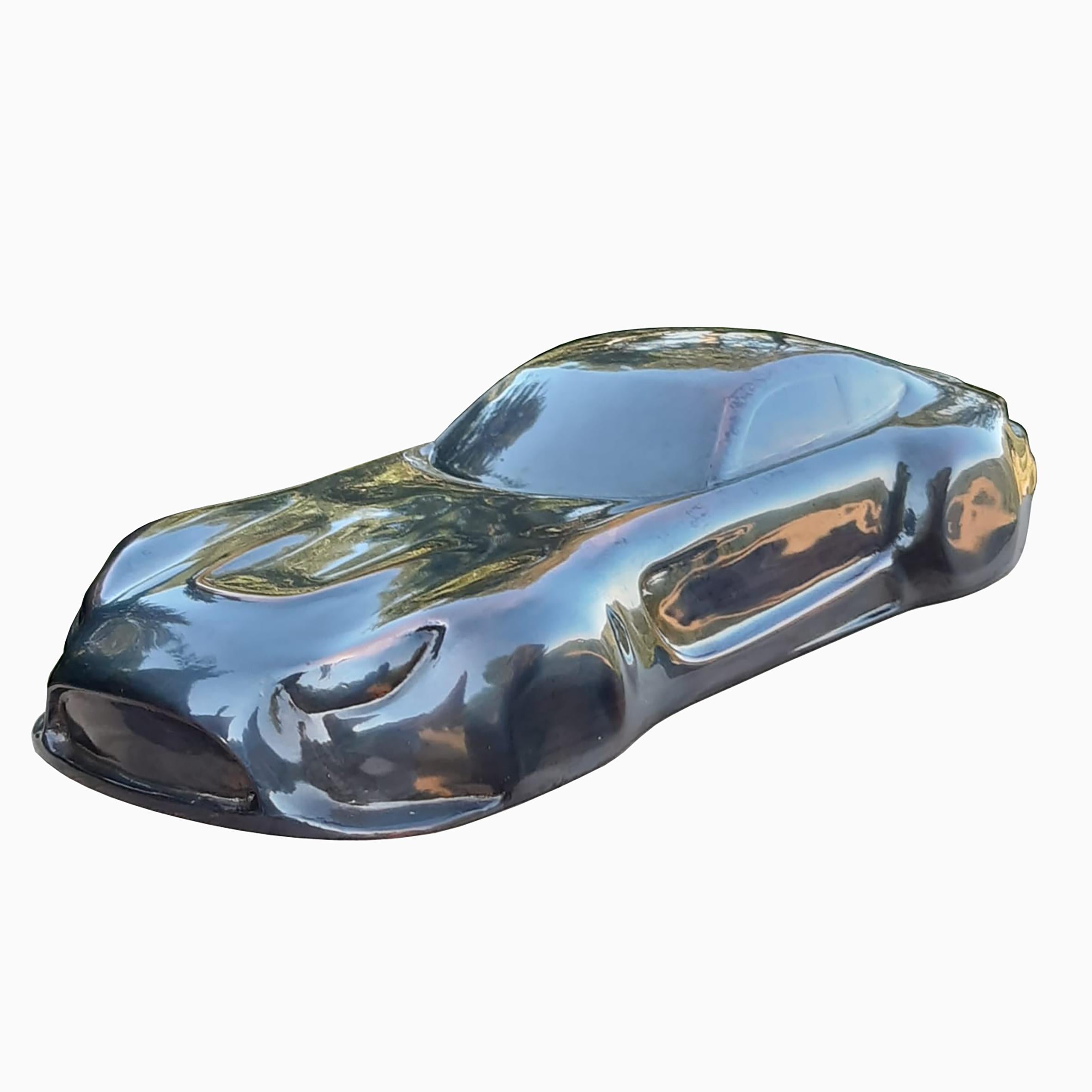 GT-M

A sculpture figuring a GT racing car.
On a rectangular wood base.

Available in various finishes, silvered, polished bronze, lacquered bronze.

Belzoni finds inspiration in the legendary racing cars of the 1950s and the 1960s as well as