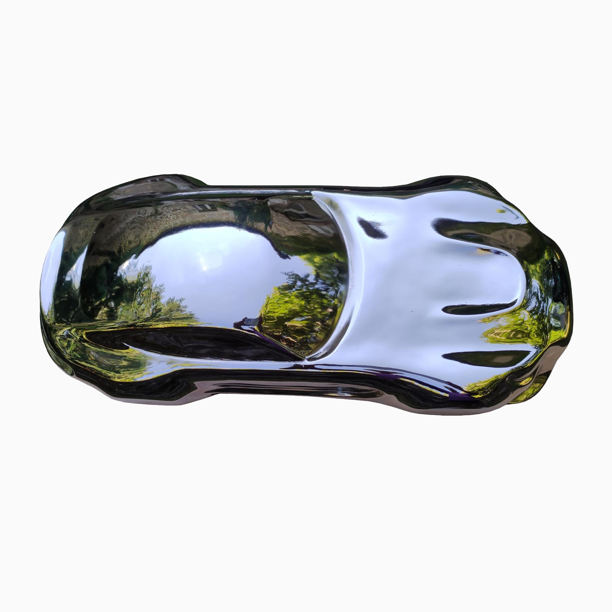 Belzoni, escultura de un coche de carreras, 