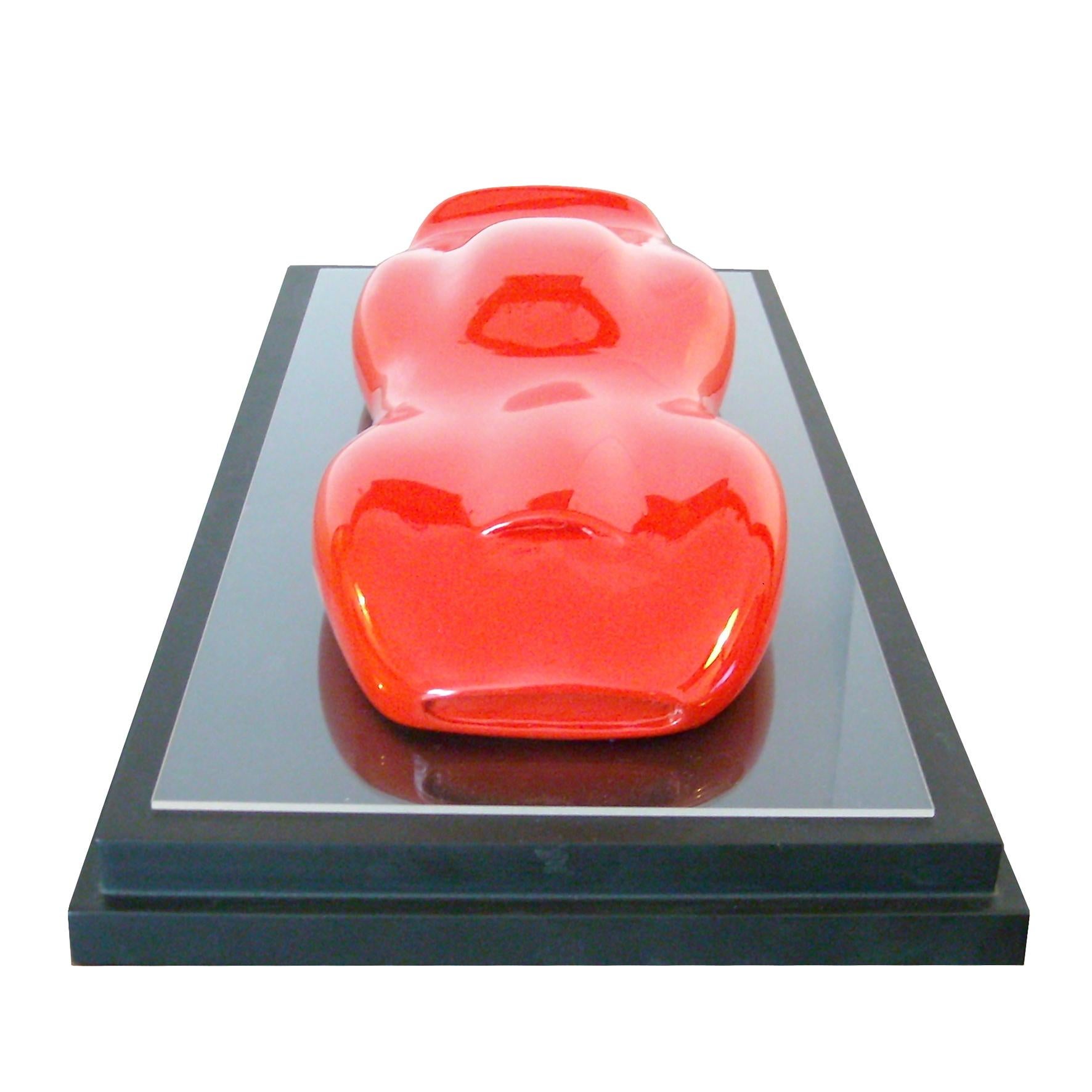 Belzoni, escultura de un coche de carreras, 