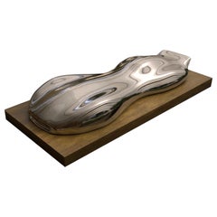 Belzoni, Escultura de un coche de carreras, "Musso"