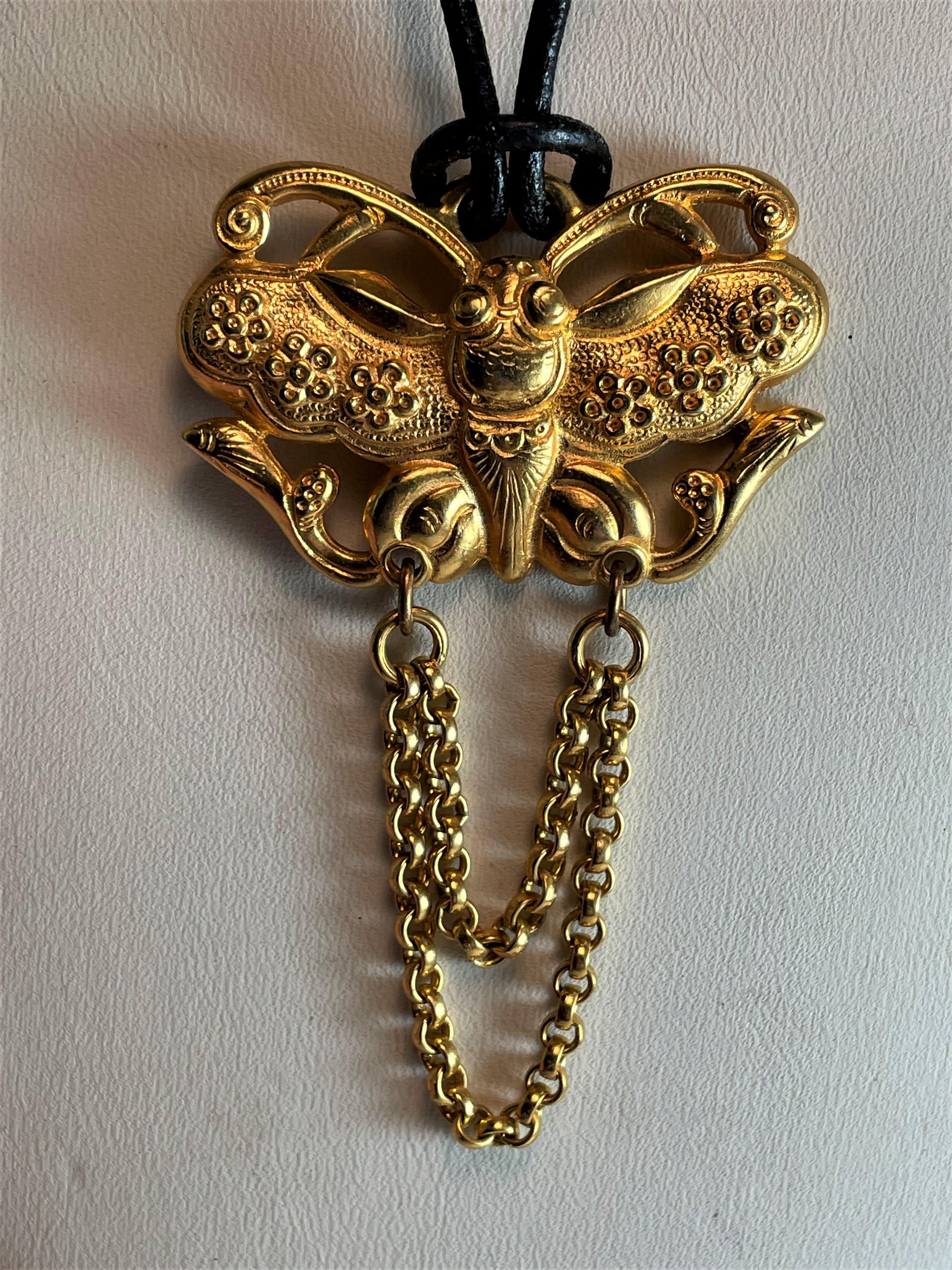 20th Century Ben-Amun Stylized Butterfly Gold Tone Pendant on Leather Cord For Sale