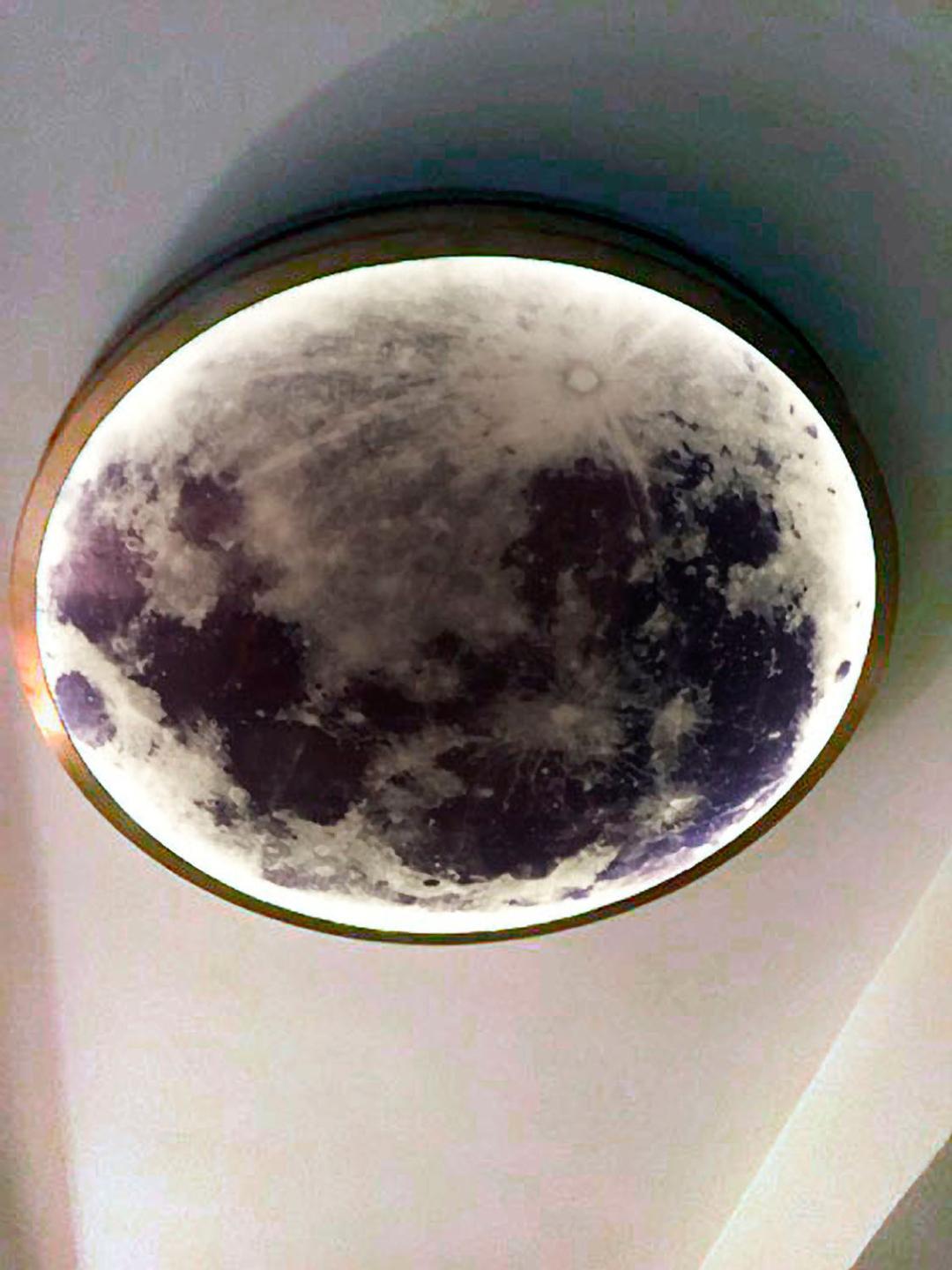 Solid bronze frame with image of the moon lit from within. This unique light was custom made for a ceiling mount. Ready to ship in original crate.
Brand new bought directly from artist, never been installed.