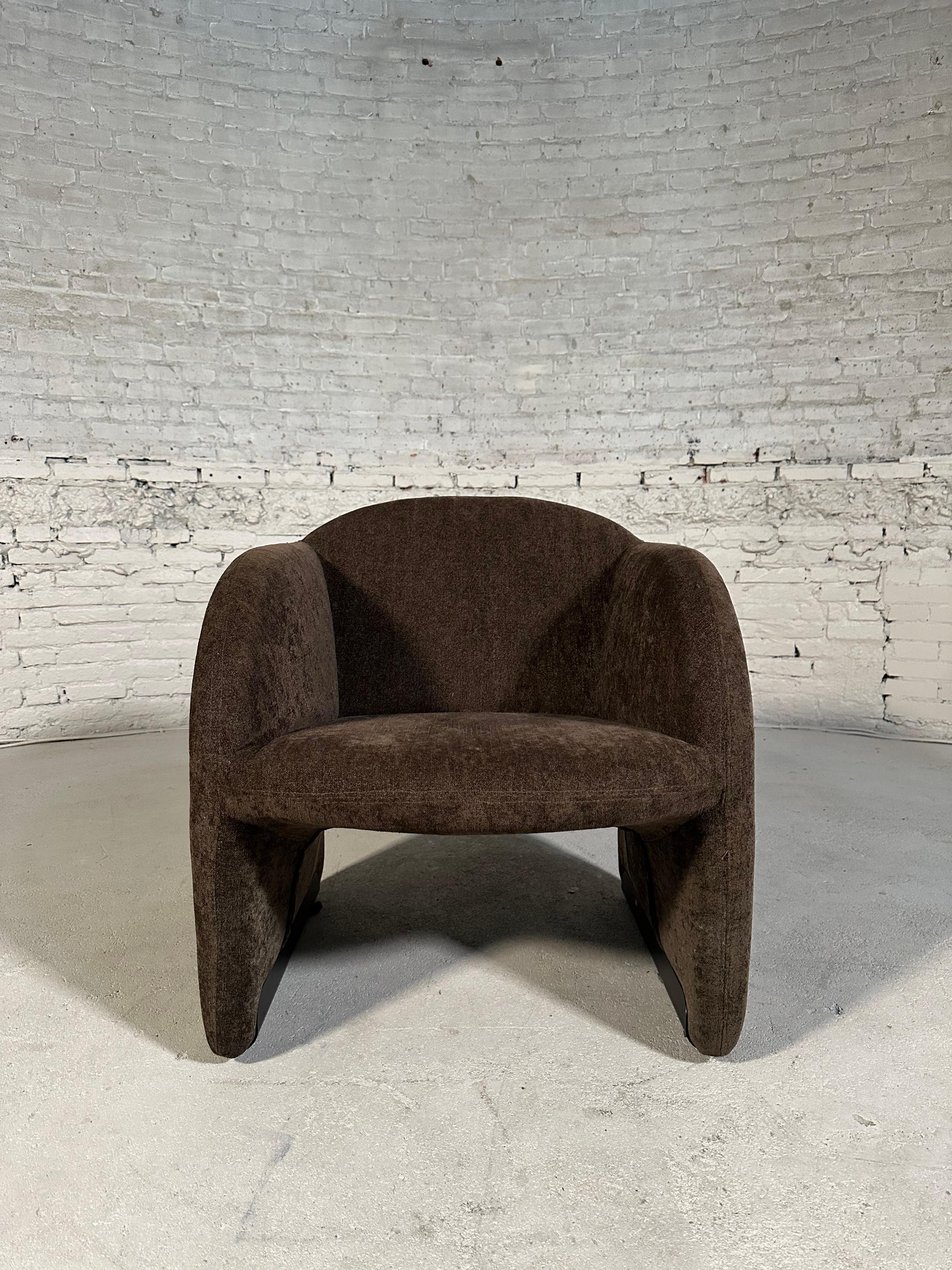 In the late 1960's and early 1970's French designer Pierre Paulin created several sculptural masterpieces for Dutch manufacturer Artifort, including this gorgeous 