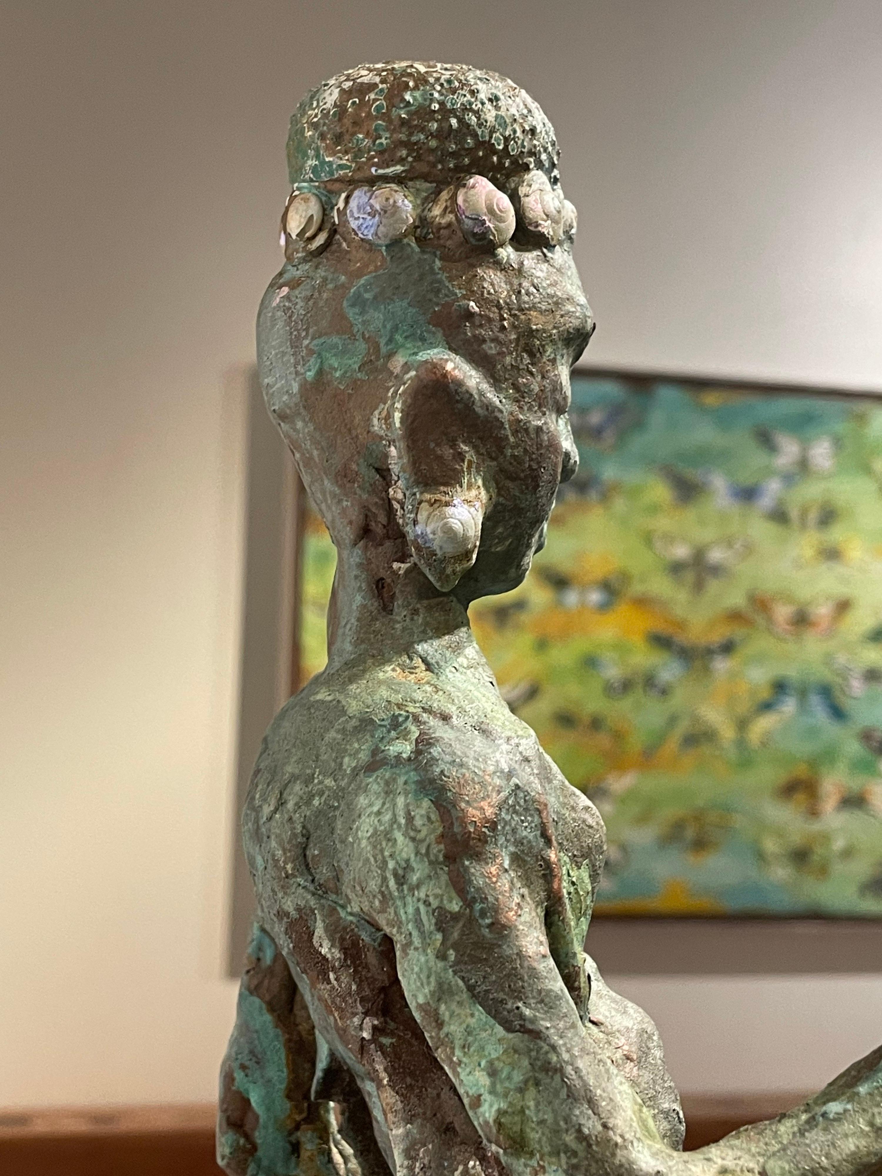 Sea Goddess, a metal and acrylic paint sculpture by artists Chris Reilly. Reilly, when not painting assembles one of a kind sculptures that leave viewers wondering how far his imagination stretches.