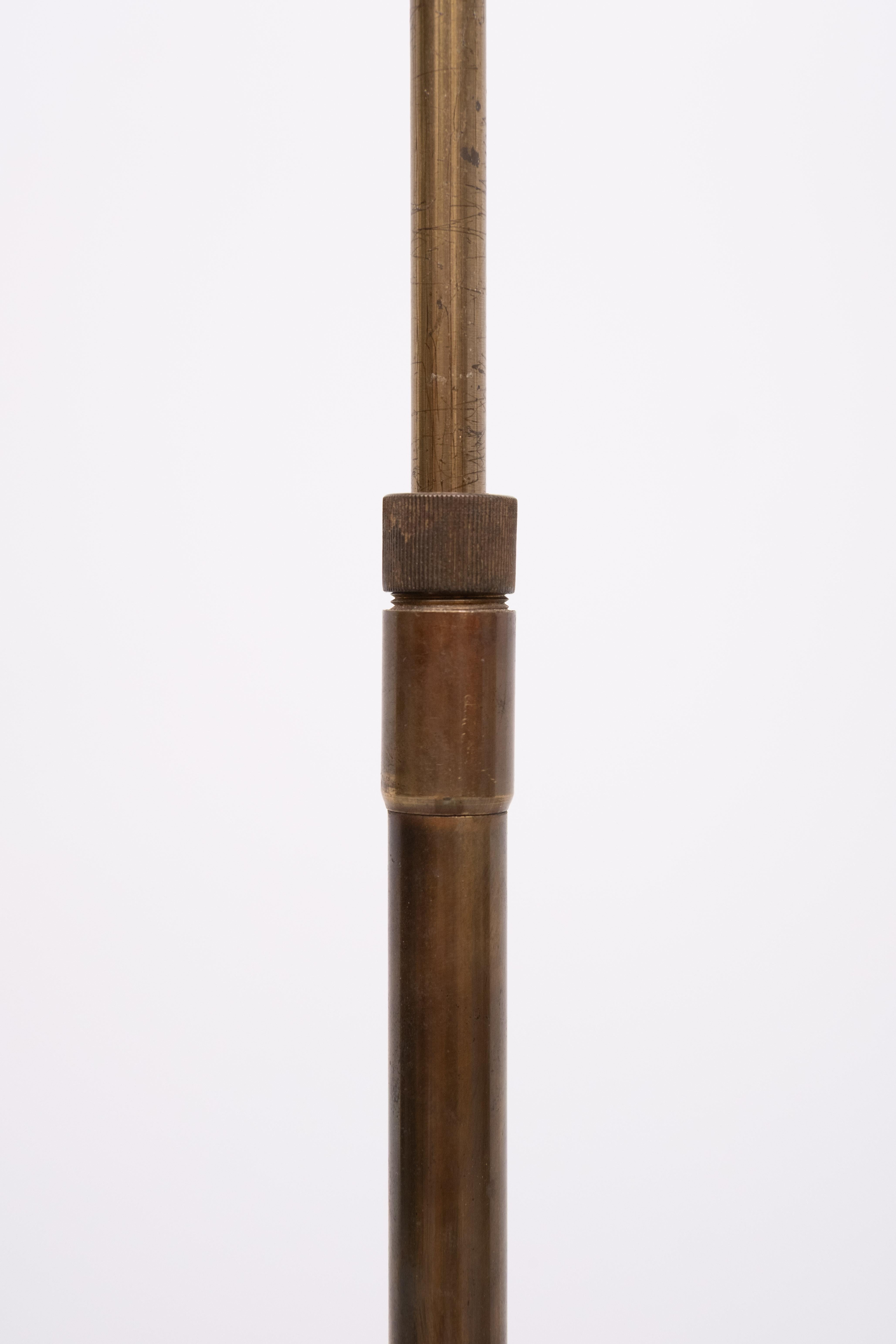 Beautiful handmade Bronze Floor lamp . Adjustable in height .
Halogen ,comes with a good working dimmer . 1980s .
Design by Ben Demmers  not longer in business .