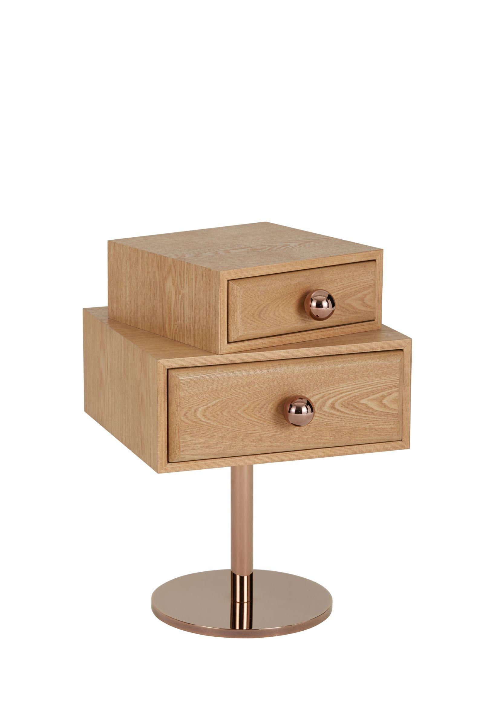 Ben King colorful stand designed by Thomas Dariel, Maison Dada
Measures: W 38 x D 36.6 x H 55 cm
Structure in MDF with painted ash veneer
Metal base plated with Champagne colour finish
Handle knob in plated metal with glossy Pink Copper