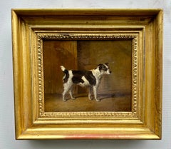 Antique 19th century English portrait of a terrier dog in an interior