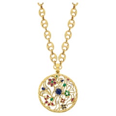 Ben Rosenfeld Pendentif et chaîne en or jaune 18 carats à motifs floraux ajourés ronds