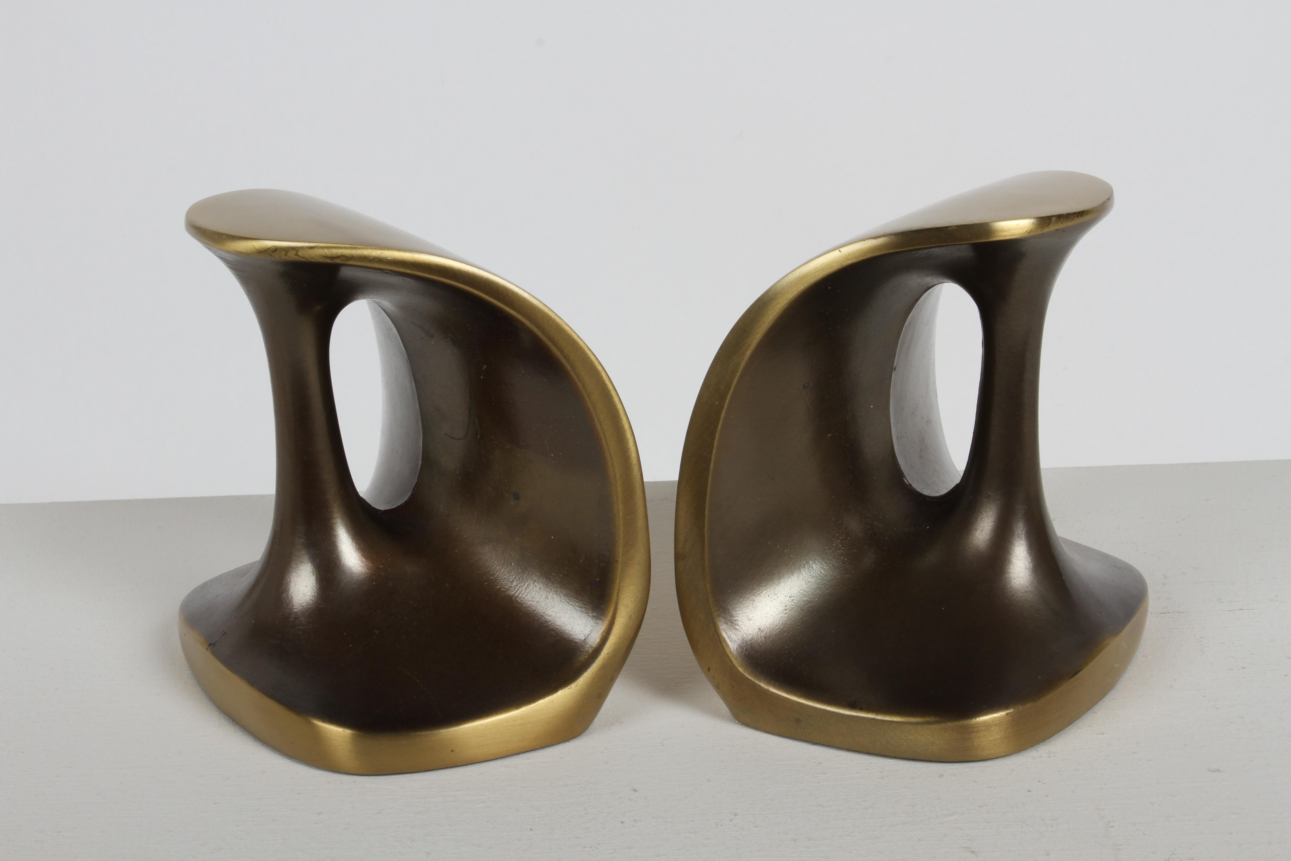 Ben Seibel MCM sculptural dumbbell brass plated bookends with handles, designed for Jenfred-Ware and marketed for Raymor c.1950s. Nice vintage condition, missing labels, 100% authentic. 
