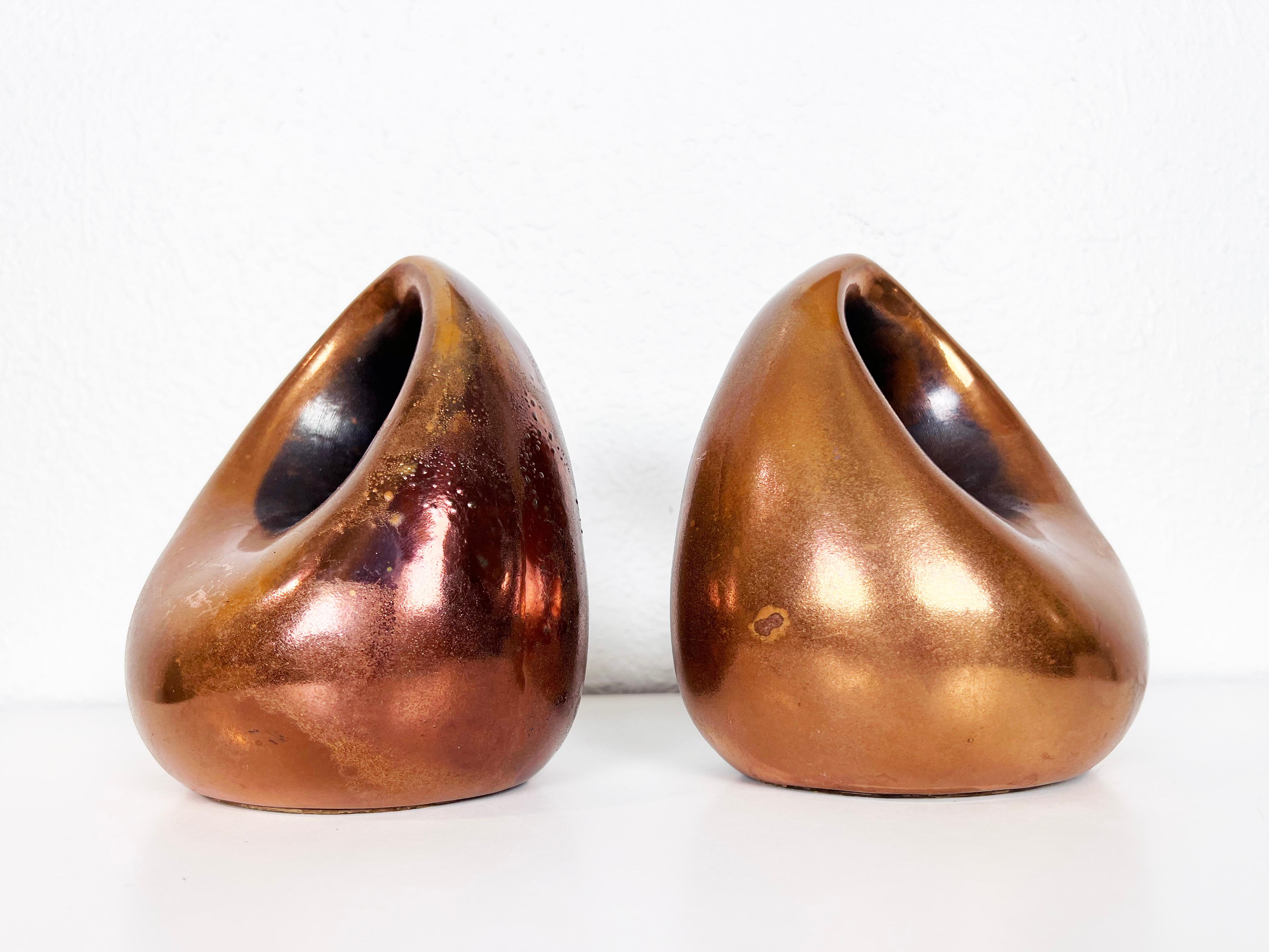 A pair of vintage sculptural copper bookends designed by Ben Seibel for Jenfred-Ware.