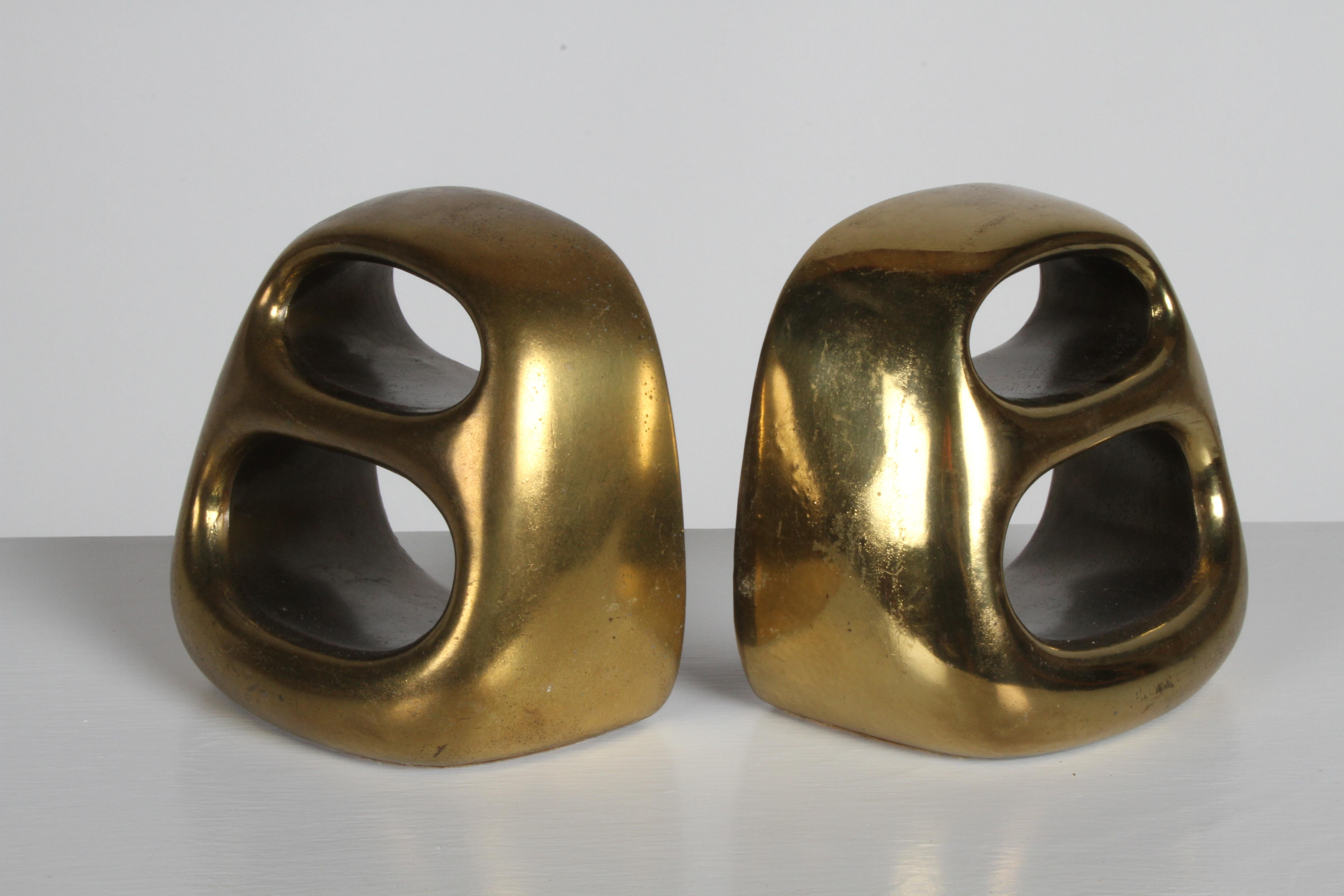 Ben Seibel bookends in brass plated finish, designed for Jenfred-Ware and marketed for Raymor. Nice vintage condition, some discoloration to brass, one is a little brighter than the other.