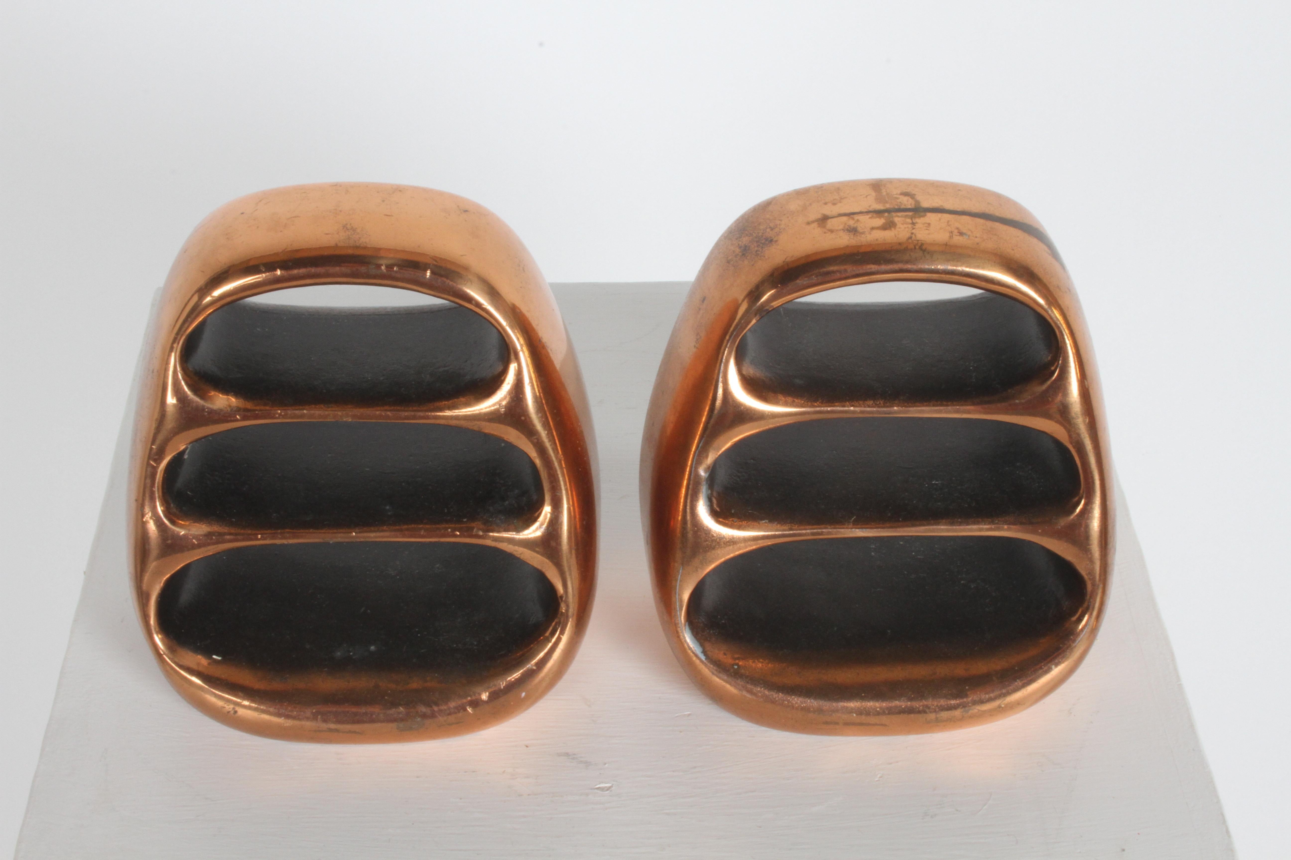 Ben Seibel bookends copper plated finish, designed for Jenfred-Ware and marketed for Raymor. Nice vintage condition, some discoloration and wear to copper finish. Labels on both.
