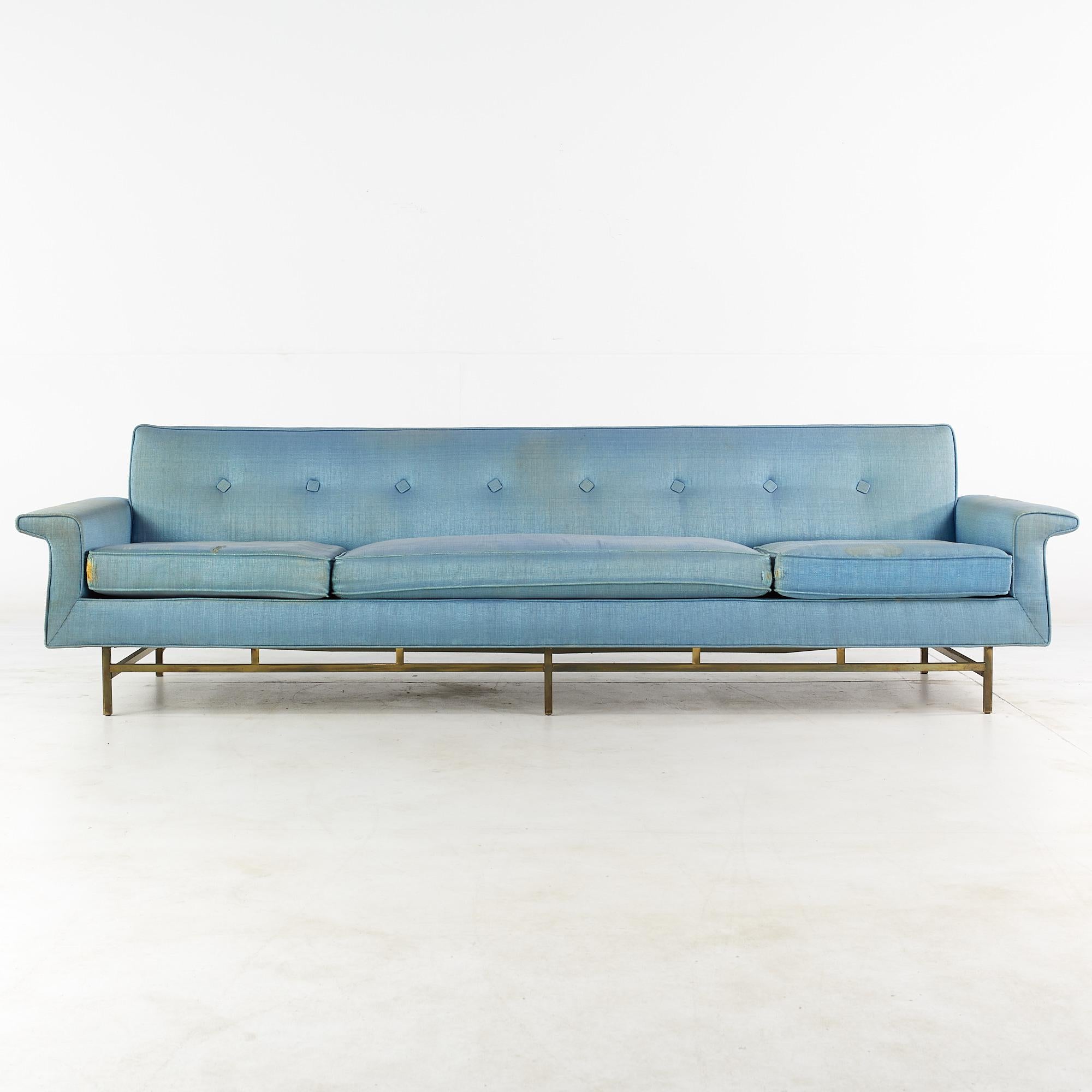 Ben Seibel for stand built furniture midcentury brass base sofa.

This sofa measures: 102 wide x 32 deep x 27 inches high, with a seat height of 16 and arm height of 19.75 inches

Ready for new upholstery. This service is available for an