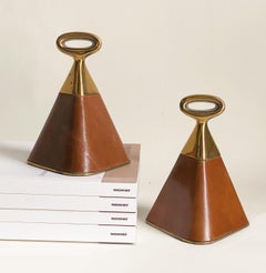 Ben Seibel Jenfred Ware, fermalibri per Raymor -- Pelle e ottone, metà del secolo scorso