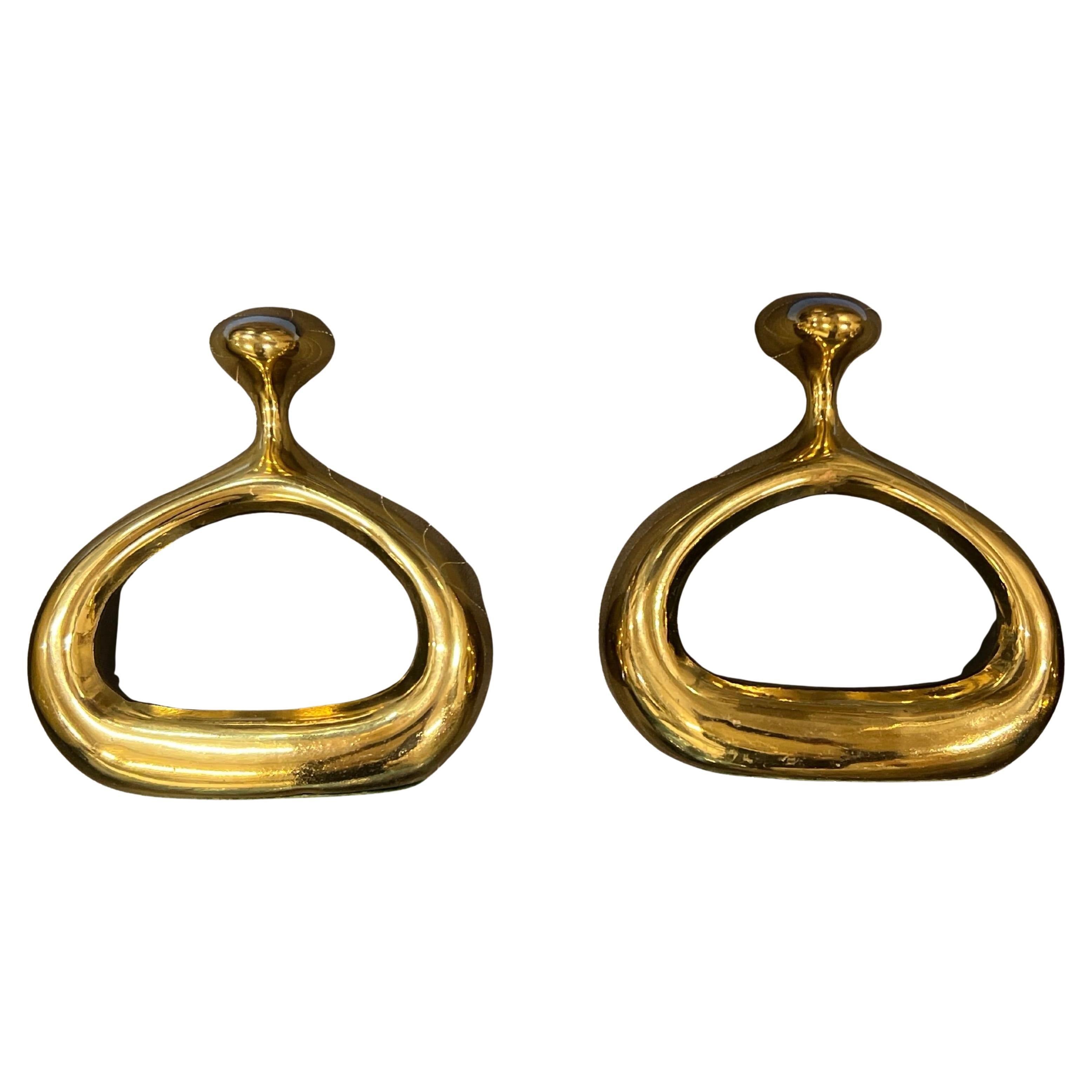 Ben Seibel Stirrup bookends, brass, Jenfred-Ware, Raymor, signed. A very clean pair with original bright warm brass finish with some minor age spotting. Impressed signatures: Jenfred on back lower edges. The undersides are covered with the original