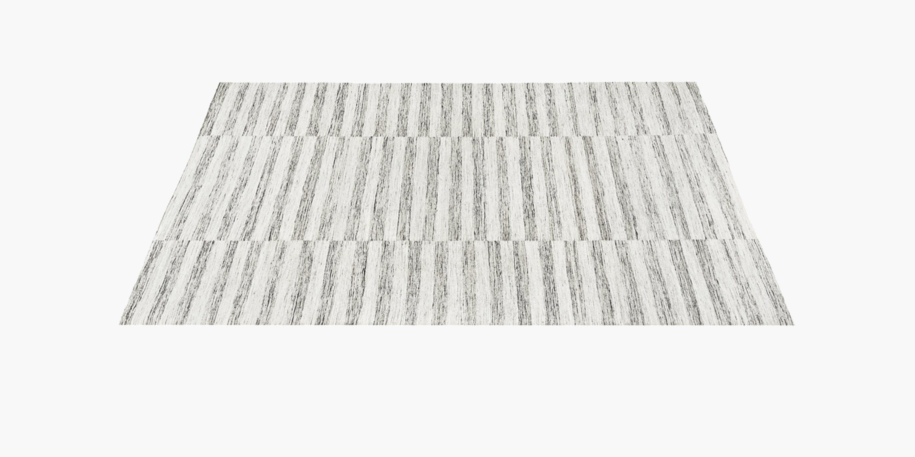 Expertly hand-woven by master artisans from soft, luscious wool, the Alterno is artfully distressed to adopt the look of a treasured heirloom. The beautifully textured yarn adds depth and dimension, along with a luxurious feeling underfoot. The Ben
